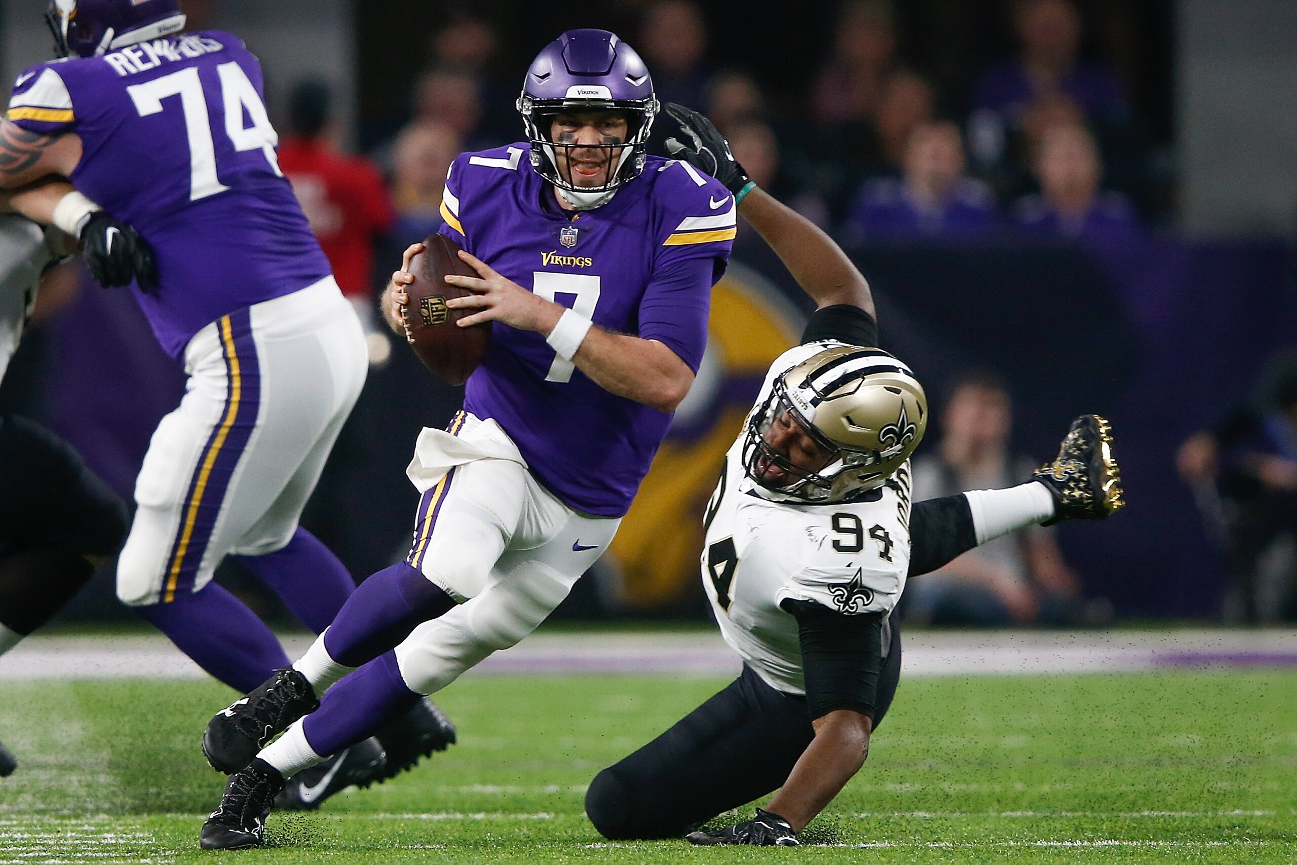 MINNEAPOLIS, MN - JANUARY 14: Case Keenum #7 of the Minnesota Vikings scrambles with the ball chased by Cameron Jordan #94 of the New Orleans Saints during the first half of the NFC Divisional Playoff game at U.S. Bank Stadium on January 14, 2018 in Minn MINNEAPOLIS, MN - JANUARY 14: Case Keenum #7 of the Minnesota Vikings scrambles with the ball chased by Cameron Jordan #94 of the New Orleans Saints during the first half of the NFC Divisional Playoff game at U.S. Bank Stadium on January 14, 2018 in Minn