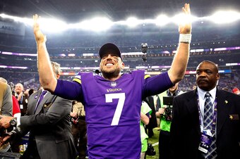 MINNEAPOLIS, MN - JANUARY 14:  Quarterback Case Keenum #7 of the Minnesota Vikings celebrates as he walks off the field after the Vikings defeated the New Orleans Saints 29-24 to win the NFC divisional round playoff game at U.S. Bank Stadium on January 14