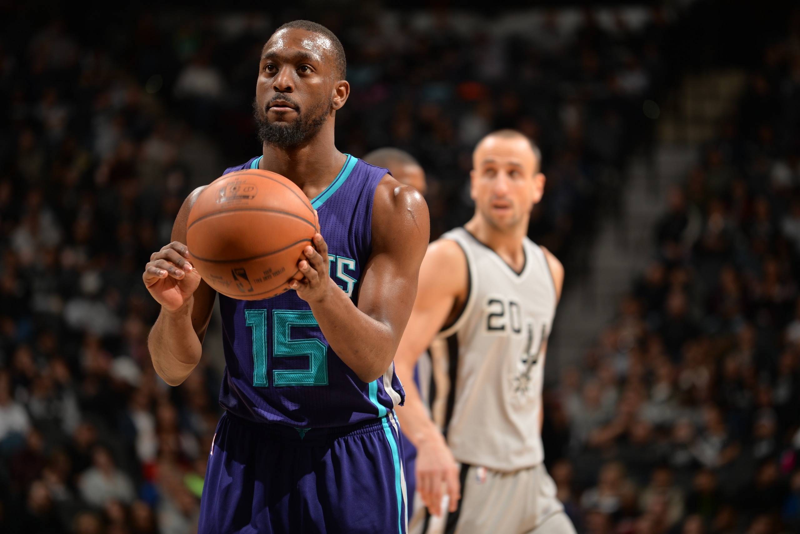 SAN ANTONIO, TX - JANUARY 7:  Kemba Walker #15 of the Charlotte Hornets shoots a free throw against the San Antonio Spurson January 7, 2017 at the AT&T Center in San Antonio, Texas. NOTE TO USER: User expressly acknowledges and agrees that, by downloading