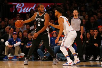 NEW YORK, NY - JANUARY 02:  (NEW YORK DAILIES OUT)    Kawhi Leonard #2 of the San Antonio Spurs in action against Courtney Lee #5 of the New York Knicks at Madison Square Garden on January 2, 2018 in New York City. The Spurs defeated the Knicks 100-91. NO