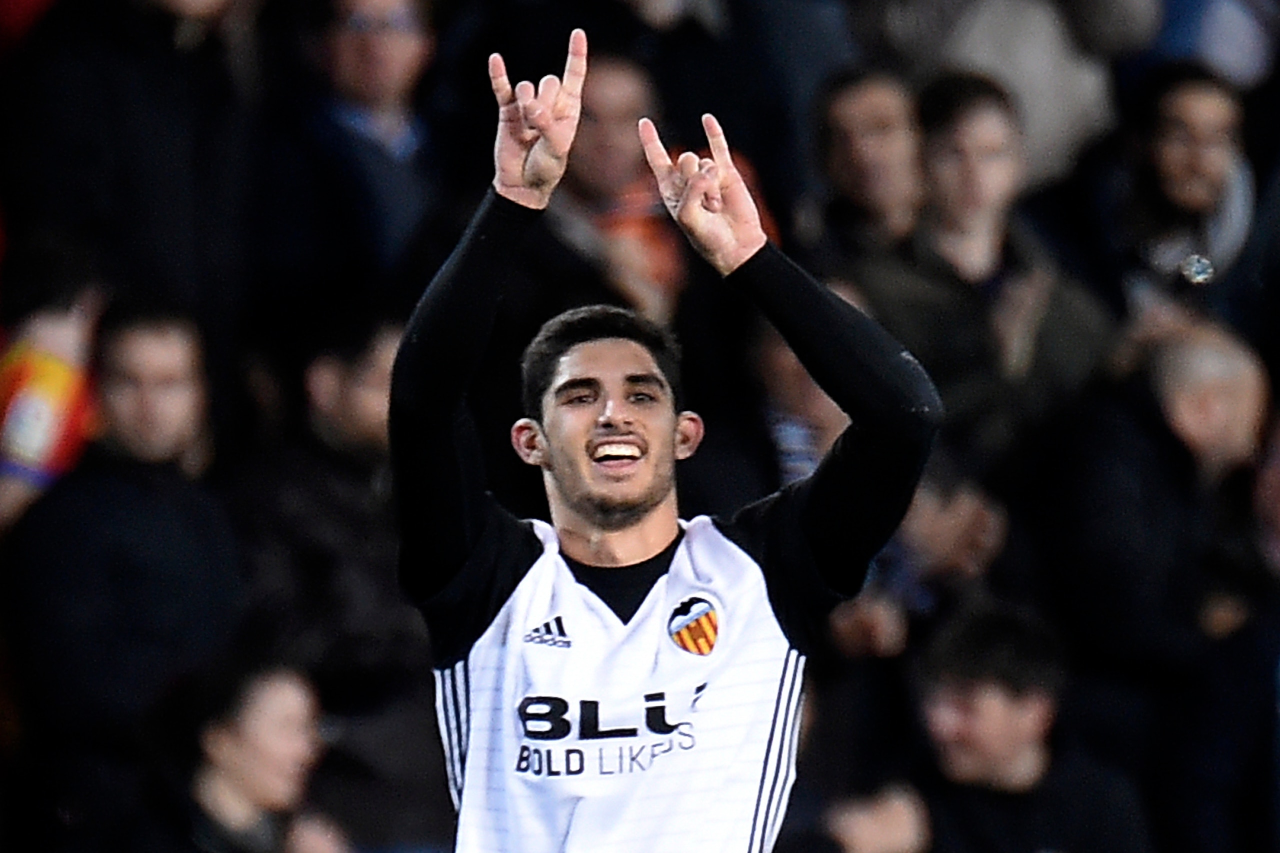Valencia's Portuguese forward Goncalo Guedes celebrates a goal during the Spanish 'Copa del Rey' (King's cup) football match between Valencia CF and Deportivo Alaves at the Mestalla stadium in Valencia on January 17, 2018. / AFP PHOTO / JOSE JORDAN       