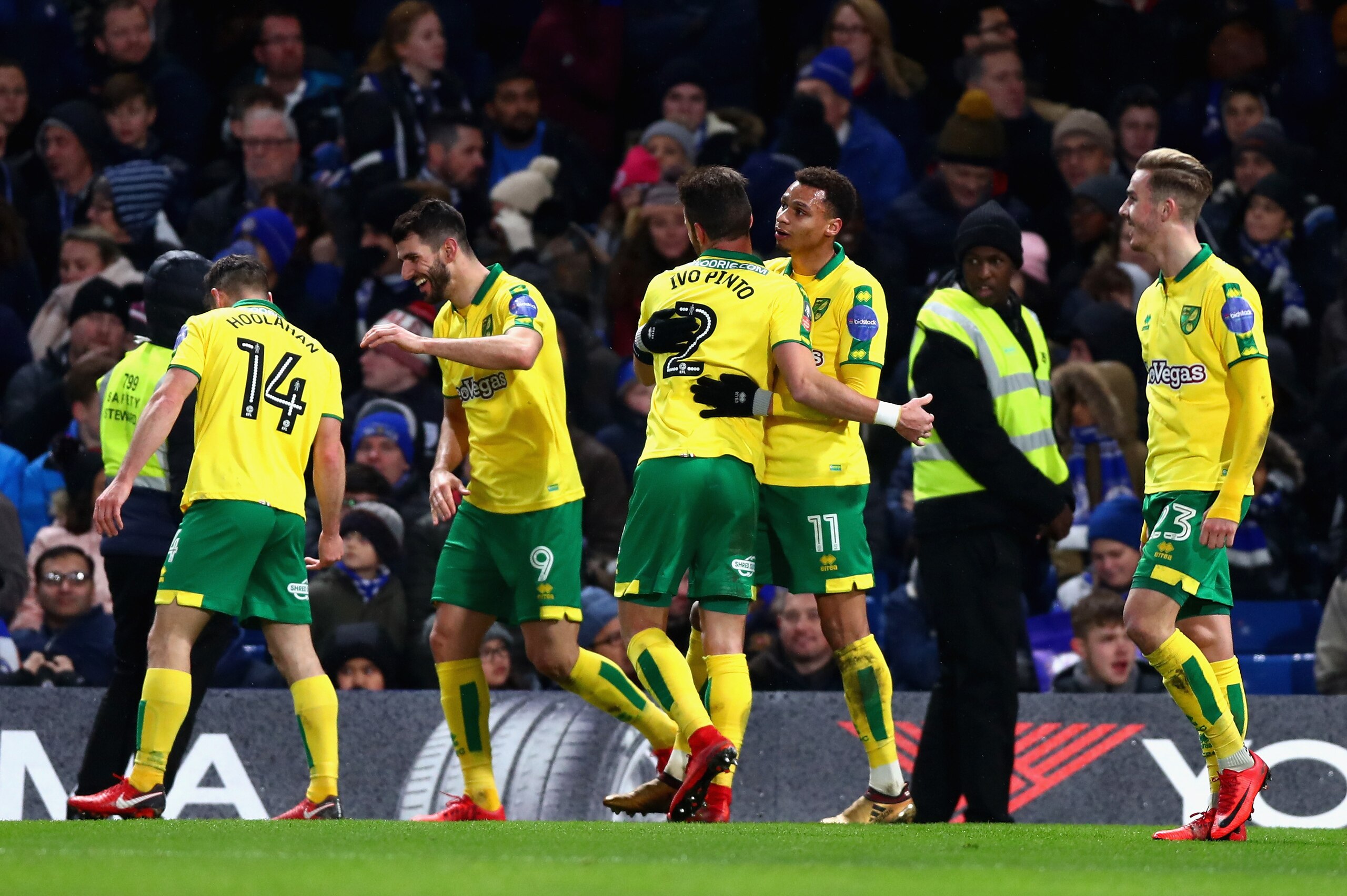 LONDON, ENGLAND - JANUARY 17:  Norwich City celebrate after Jamal Lewis of Norwich City scores his sides first goal during The Emirates FA Cup Third Round Replay between Chelsea and Norwich City at Stamford Bridge on January 17, 2018 in London, England.  