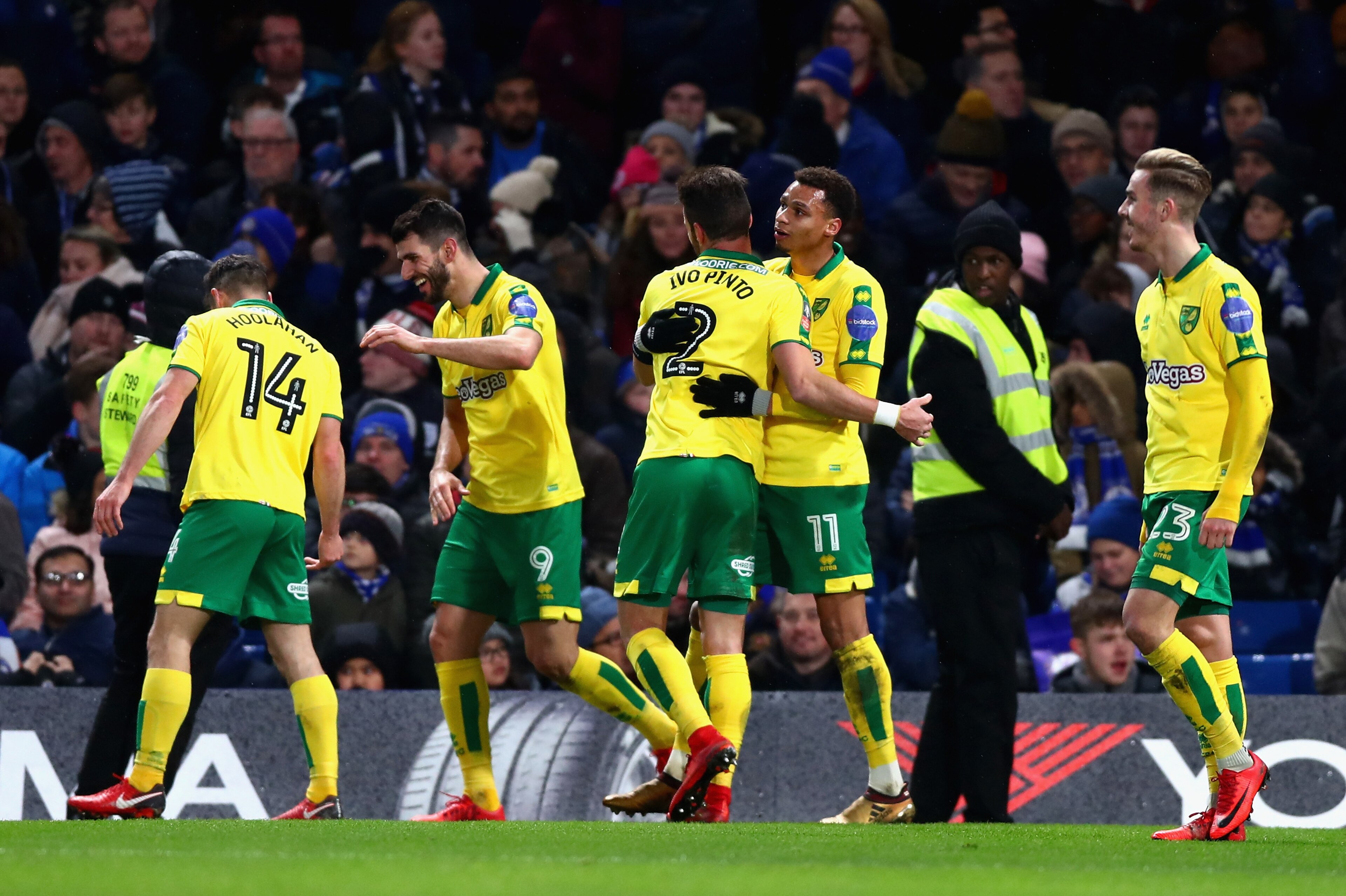 LONDON, ENGLAND - JANUARY 17: Norwich City celebrate after Jamal Lewis of Norwich City scores his sides first goal during The Emirates FA Cup Third Round Replay between Chelsea and Norwich City at Stamford Bridge on January 17, 2018 in London, England. LONDON, ENGLAND - JANUARY 17: Norwich City celebrate after Jamal Lewis of Norwich City scores his sides first goal during The Emirates FA Cup Third Round Replay between Chelsea and Norwich City at Stamford Bridge on January 17, 2018 in London, England.