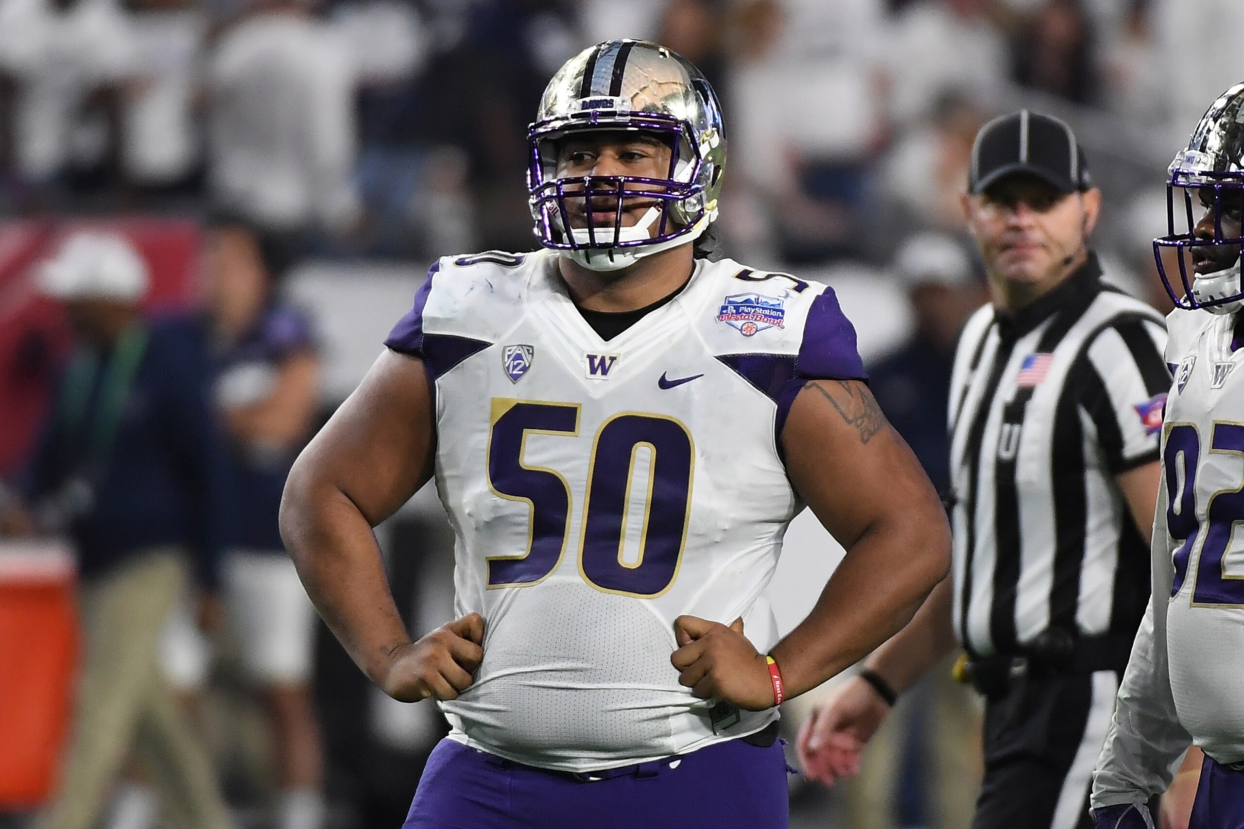 GLENDALE, AZ - DECEMBER 30:  Vita Vea #50 of the Washington Huskies looks across the line of scrimmage prior to a play against the Penn State Nittany Lions during the Playstation Fiesta Bowl at University of Phoenix Stadium on December 30, 2017 in Glendal