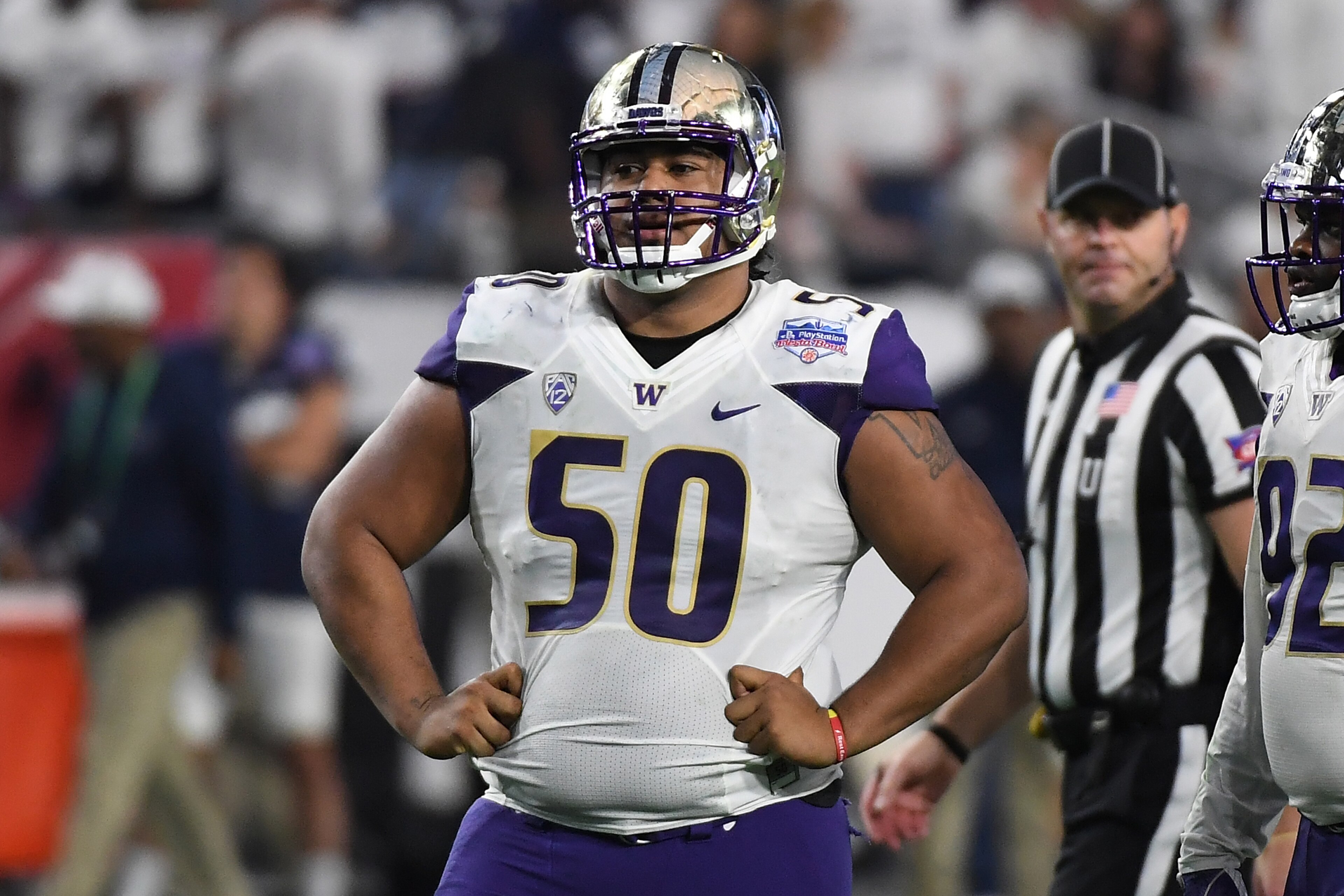 GLENDALE, AZ - DECEMBER 30:  Vita Vea #50 of the Washington Huskies looks across the line of scrimmage prior to a play against the Penn State Nittany Lions during the Playstation Fiesta Bowl at University of Phoenix Stadium on December 30, 2017 in Glendal