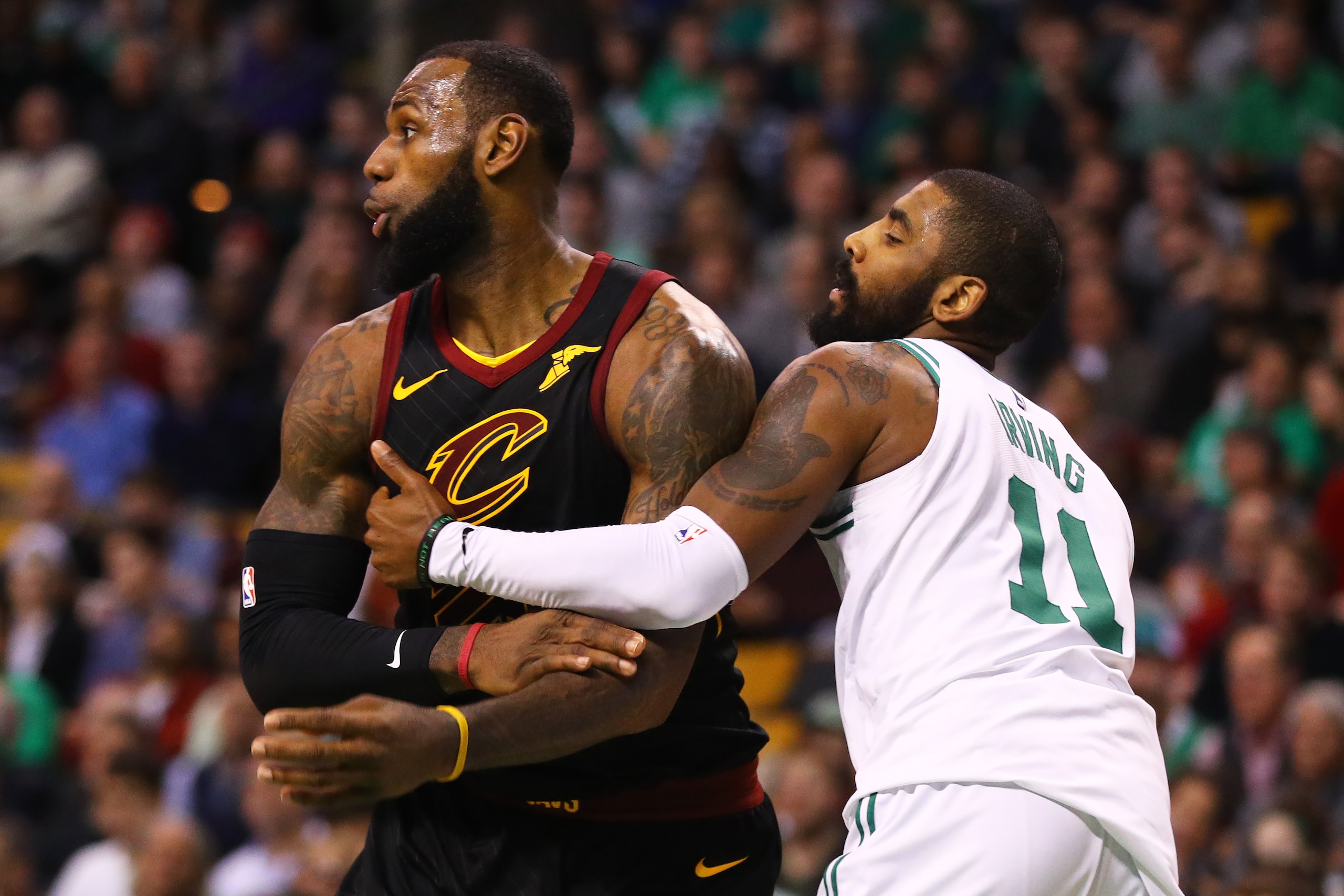 BOSTON, MA - JANUARY 3: LeBron James #23 of the Cleveland Cavaliers and Kyrie Irving #11 of the Boston Celtics defend each other during the second half at TD Garden on January 3, 2018 in Boston, Massachusetts. (Photo by Maddie Meyer/Getty Images)