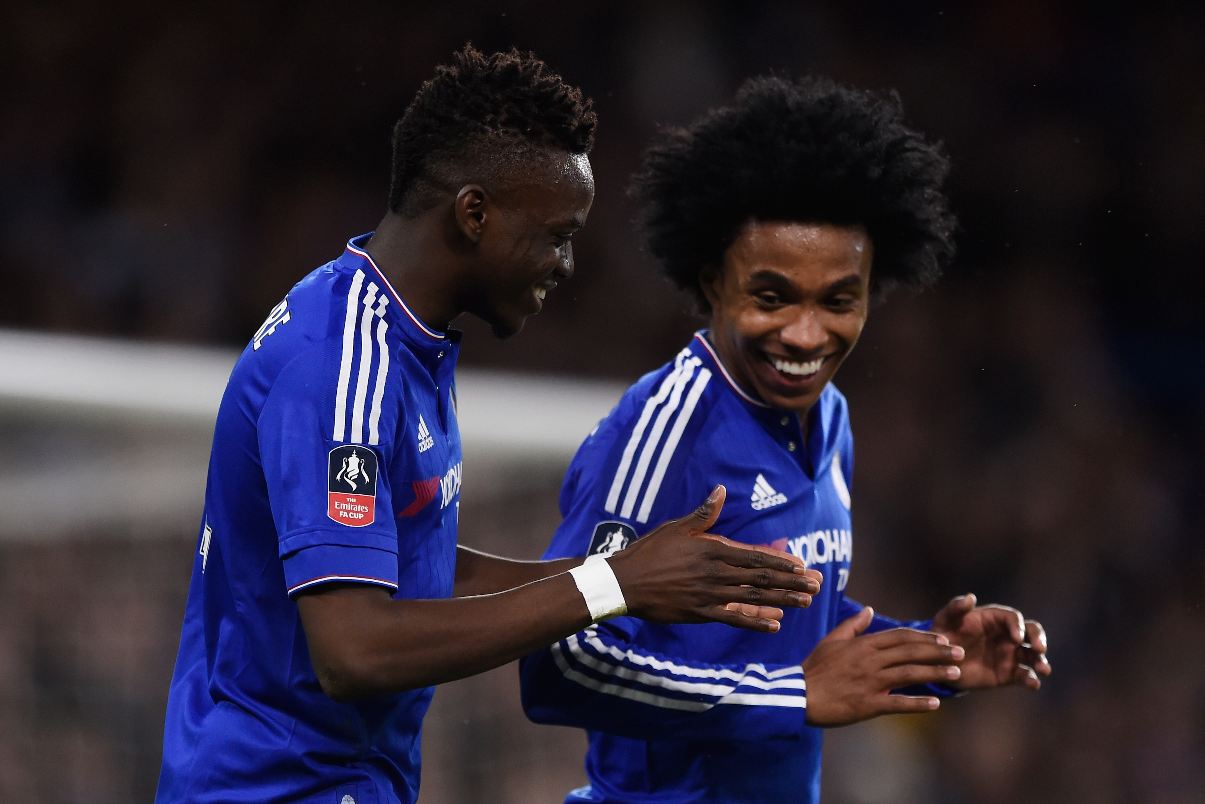 LONDON, ENGLAND - FEBRUARY 21: Bertrand Traore of Chelsea celebrates with teammate Willian (R) after scoring his team's fifth goal during The Emirates FA Cup fifth round match between Chelsea and Manchester City at Stamford Bridge on February 21, 2016 in LONDON, ENGLAND - FEBRUARY 21: Bertrand Traore of Chelsea celebrates with teammate Willian (R) after scoring his team's fifth goal during The Emirates FA Cup fifth round match between Chelsea and Manchester City at Stamford Bridge on February 21, 2016 in
