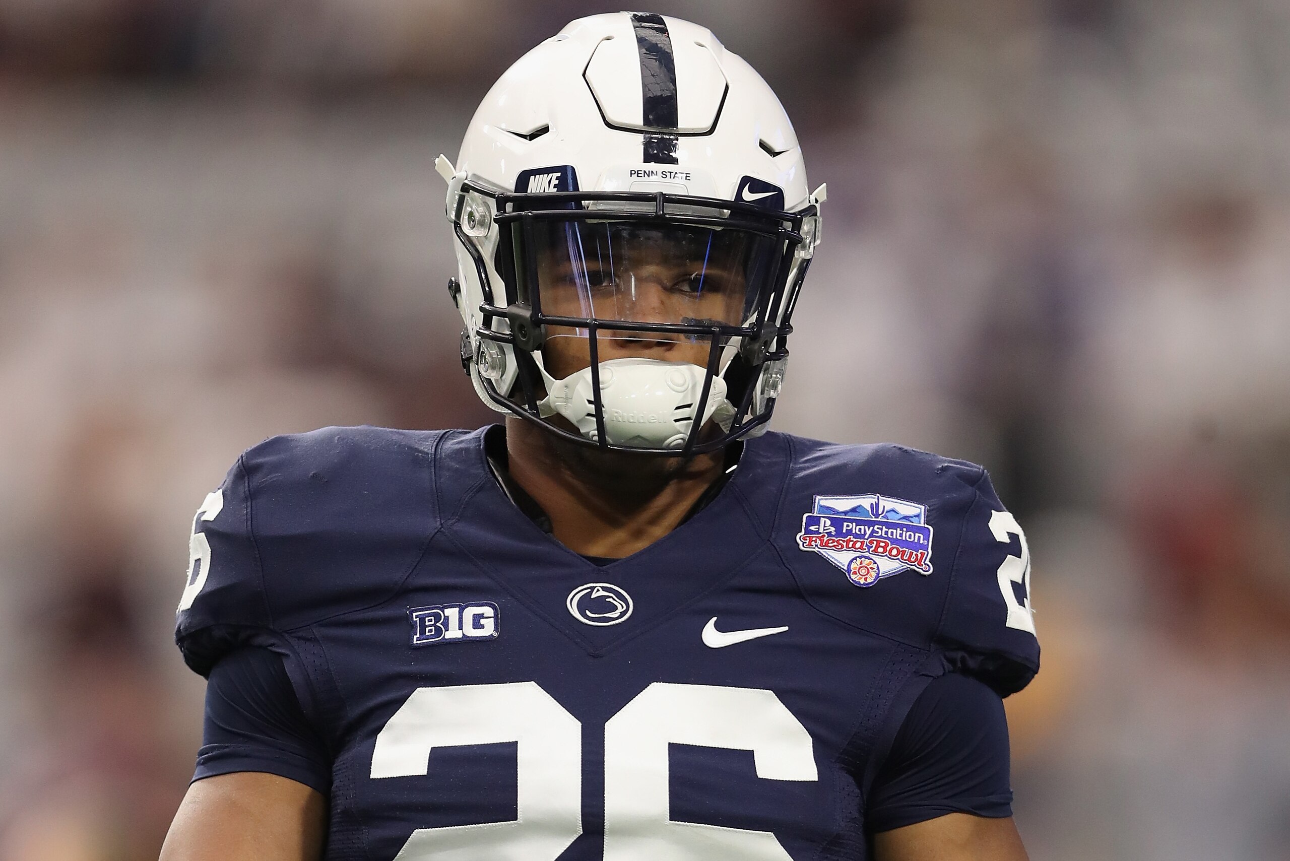 GLENDALE, AZ - DECEMBER 30:  Running back Saquon Barkley #26 of the Penn State Nittany Lions warms up before the Playstation Fiesta Bowl against the Washington Huskies at University of Phoenix Stadium on December 30, 2017 in Glendale, Arizona. The Nittany