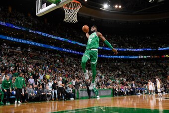 BOSTON, MA - NOVEMBER 16:  Jaylen Brown #7 of the Boston Celtics goes in to dunk the ball against the Golden State Warriors on November 16, 2017 at the TD Garden in Boston, Massachusetts.  NOTE TO USER: User expressly acknowledges and agrees that, by down