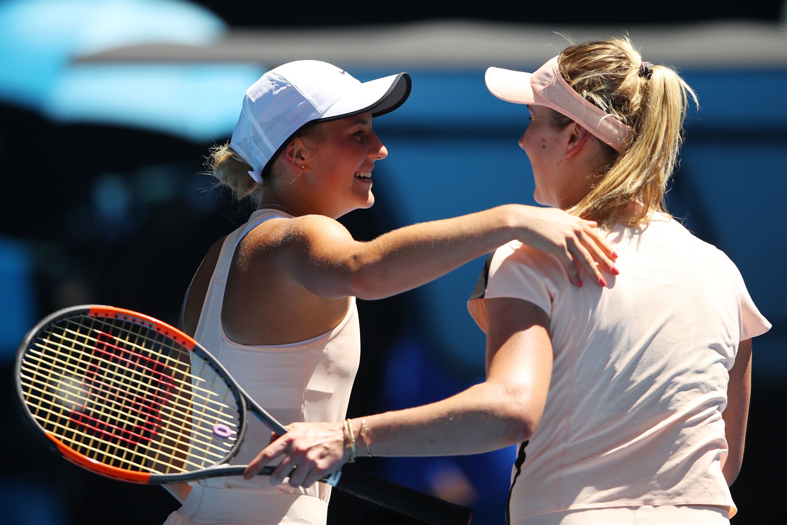 MELBOURNE, AUSTRALIA - JANUARY 19:  Marta Kostyuk (L) of Ukraine congratulates Elina Svitolina of Ukraine after Svitolina won their third round match on day five of the 2018 Australian Open at Melbourne Park on January 19, 2018 in Melbourne, Australia.  (