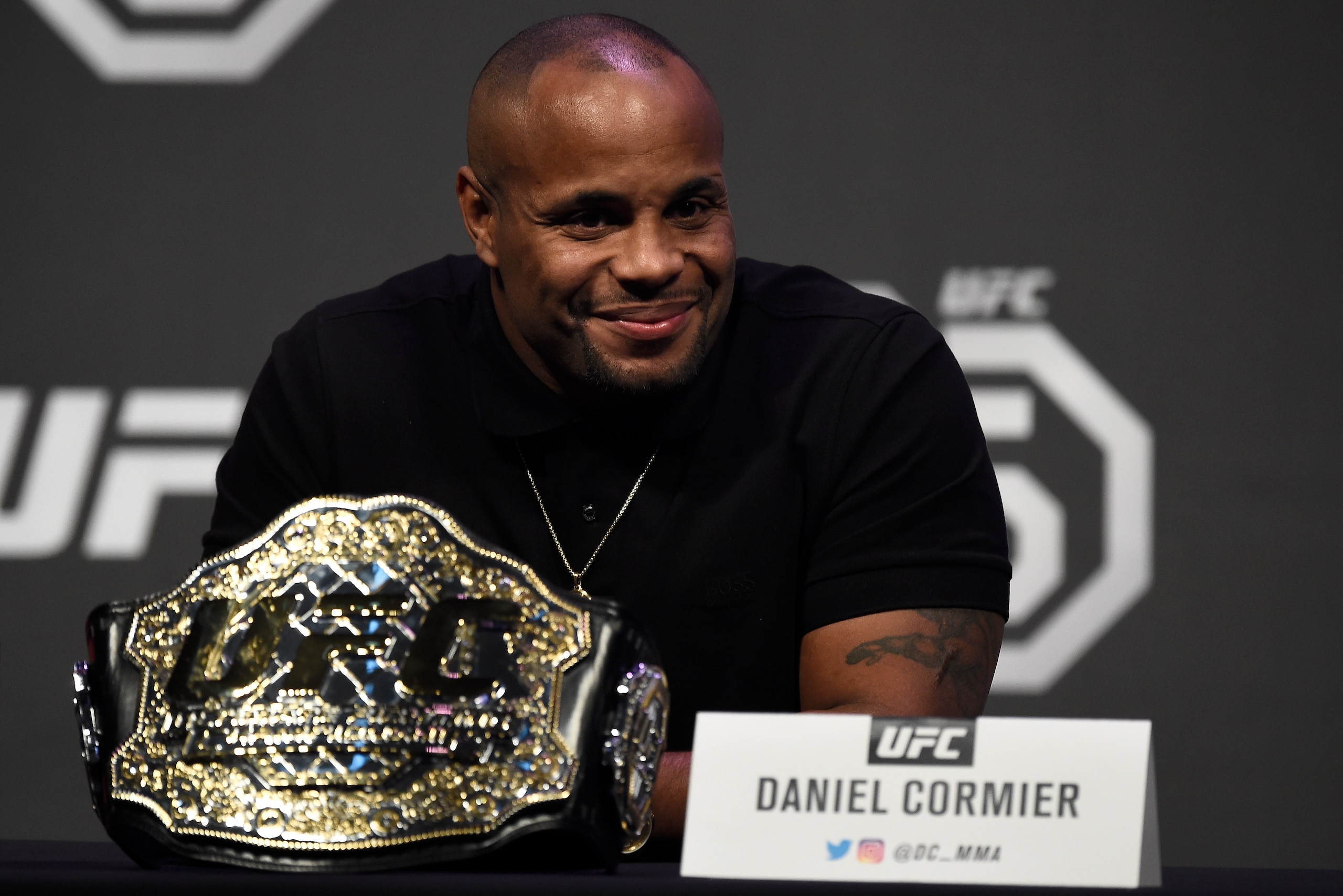 LAS VEGAS, NV - DECEMBER 29:  UFC light heavyweight champion Daniel Cormier interacts with media during the UFC 220 press conference inside T-Mobile Arena on December 29, 2017 in Las Vegas, Nevada. (Photo by Jeff Bottari/Zuffa LLC/Zuffa LLC via Getty Imag