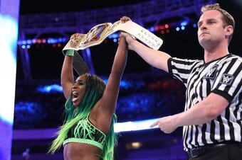 Naomi celebrates winning the SmackDown Women's Championship at WrestleMania 33.