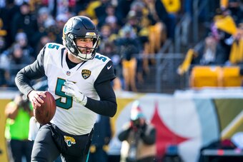 PITTSBURGH, PA - JANUARY 14:  Blake Bortles #5 of the Jacksonville Jaguars runs with the ball during the first half of the AFC Divisional Playoff game against the Pittsburgh Steelers at Heinz Field on January 14, 2018 in Pittsburgh, Pennsylvania. Jaguars 