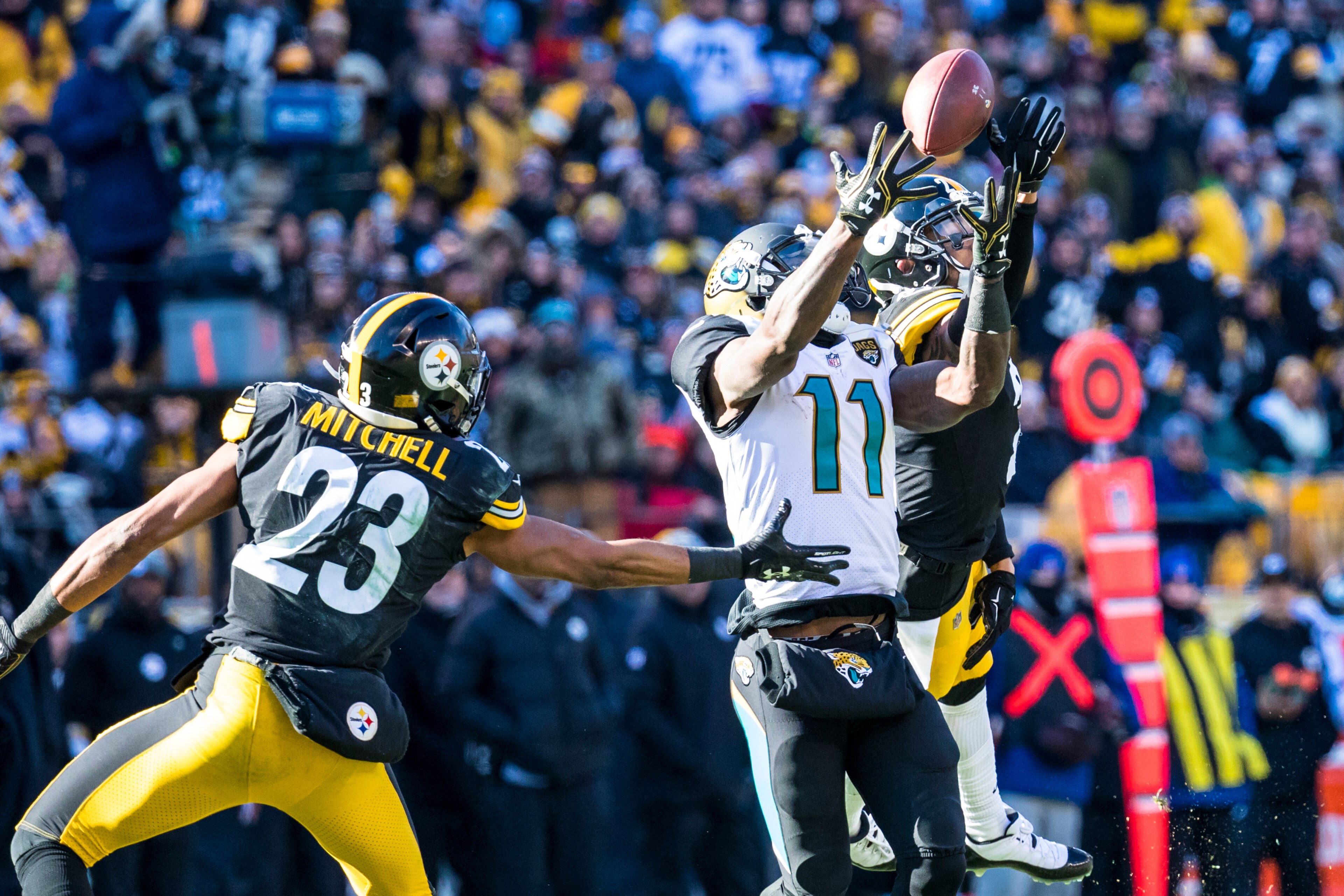 PITTSBURGH, PA - JANUARY 14:  Joe Haden #21 of the Pittsburgh Steelers breaks up a pass intended for Marqise Lee #11 of the Jacksonville Jaguars during the second quarter of the AFC Divisional Playoff game at Heinz Field on January 14, 2018 in Pittsburgh,