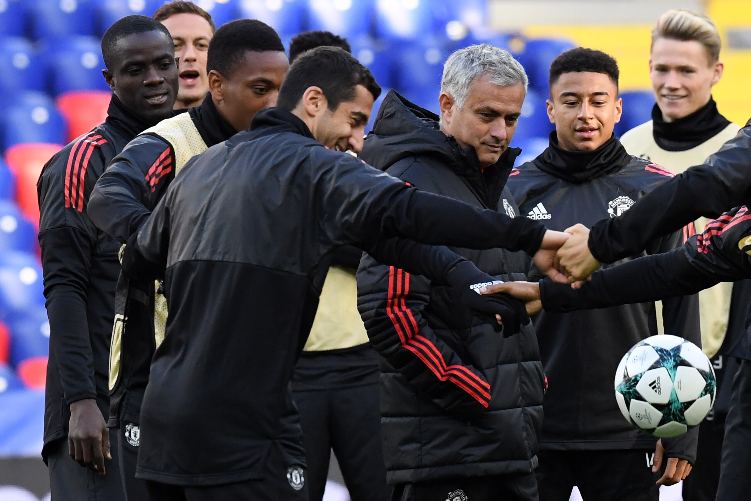Manchester United's defender from Ivory Coast Eric Bailly, Manchester United's forward from France Anthony Martial, Manchester United's midfielder from Armenia Henrikh Mkhitaryan, Manchester United's coach from Portugal Jose Mourinho and Manchester United Manchester United's defender from Ivory Coast Eric Bailly, Manchester United's forward from France Anthony Martial, Manchester United's midfielder from Armenia Henrikh Mkhitaryan, Manchester United's coach from Portugal Jose Mourinho and Manchester United