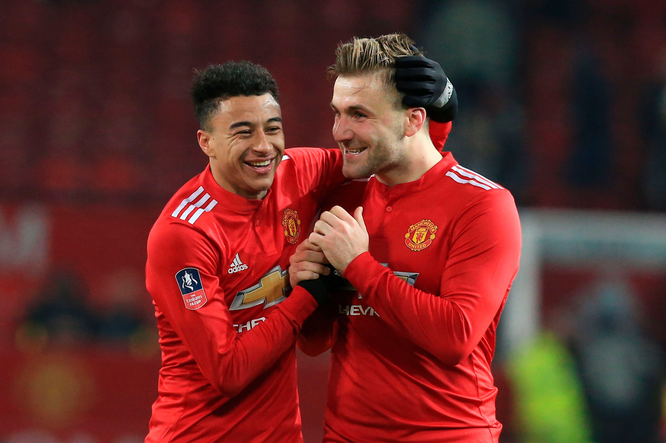 Manchester United's English midfielder Jesse Lingard (L) and Manchester United's English defender Luke Shaw (R) celebrate together after thefinal whistle of the English FA Cup third round football match between Manchester United and Derby County at Old Tr Manchester United's English midfielder Jesse Lingard (L) and Manchester United's English defender Luke Shaw (R) celebrate together after thefinal whistle of the English FA Cup third round football match between Manchester United and Derby County at Old Tr