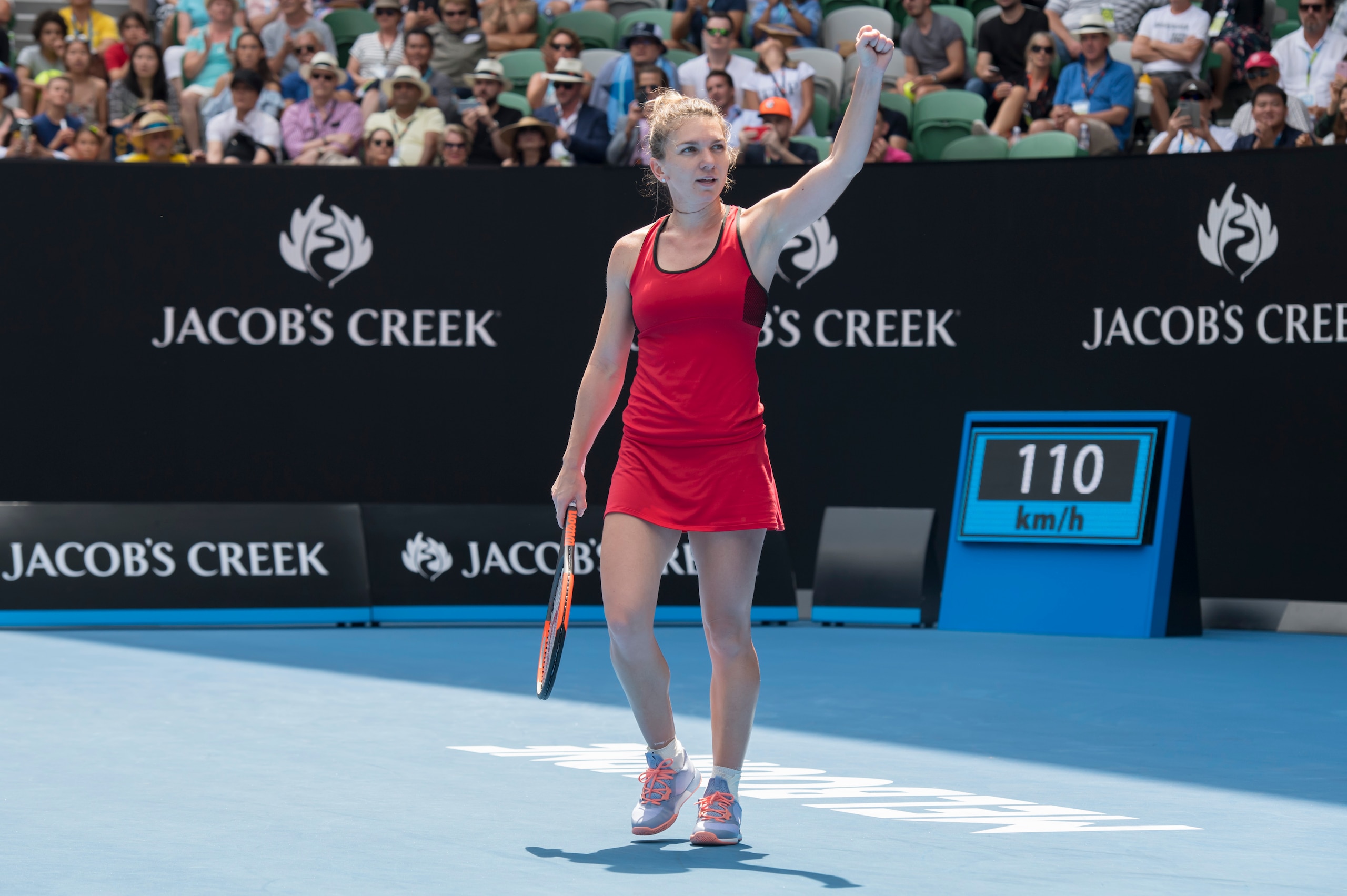 MELBOURNE, AUSTRALIA - JANUARY 20:  Simona Halep of Romania celebrates victory in her 3 hour 45 minute match against Lauren Davis of the United States on day six of the 2018 Australian Open at Melbourne Park on January 20, 2018 in Melbourne, Australia.  (