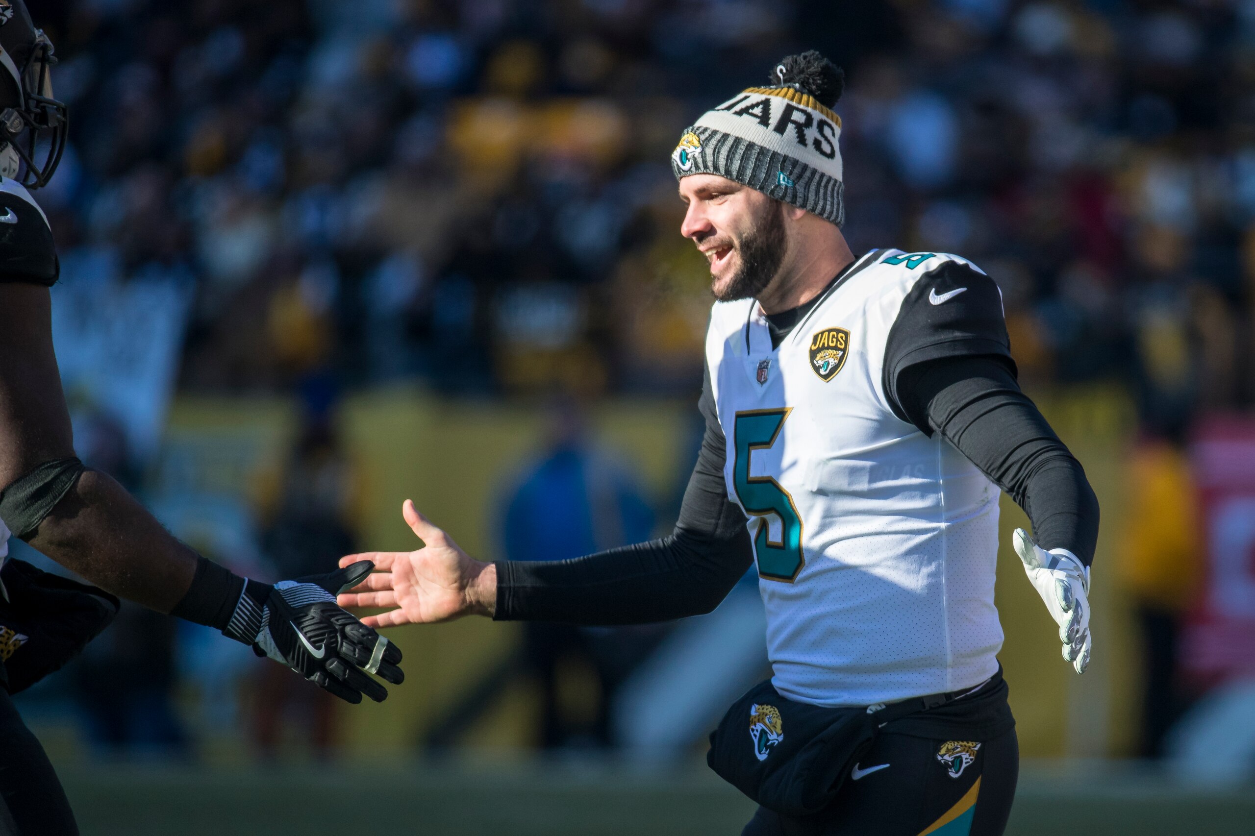 PITTSBURGH, PA - JANUARY 14:  Blake Bortles #5 of the Jacksonville Jaguars slaps hands with teammates during the second quarter against the Pittsburgh Steelers in the AFC Divisional Playoff game at Heinz Field on January 14, 2018 in Pittsburgh, Pennsylvan