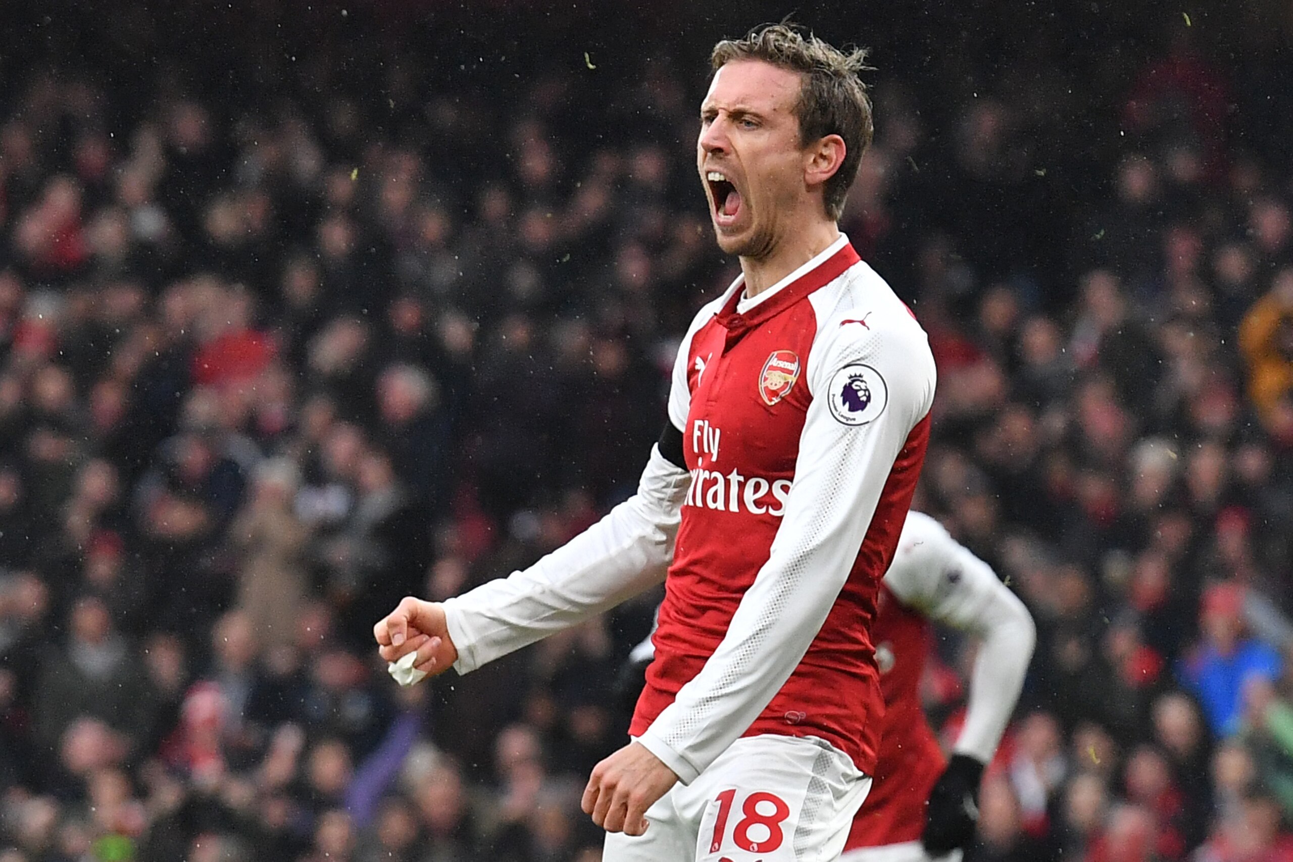 Arsenal's Spanish defender Nacho Monreal celebrates after scoring during the English Premier League football match between Arsenal and Crystal Palace at the Emirates Stadium in London on January 20, 2018.  / AFP PHOTO / Ben STANSALL / RESTRICTED TO EDITOR