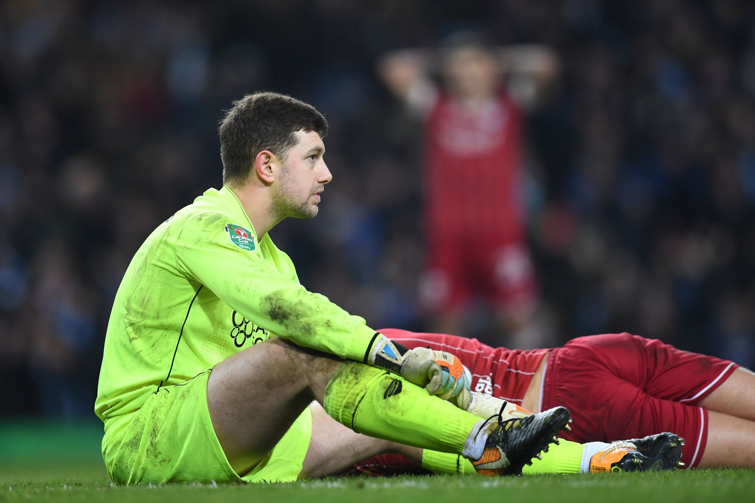 Bristol City's English goalkeeper Frank Fielding reacts after they concede a late goal during the English League Cup semi-final first leg football match between Manchester City and Bristol City at the Etihad Stadium in Manchester, north west England, on J