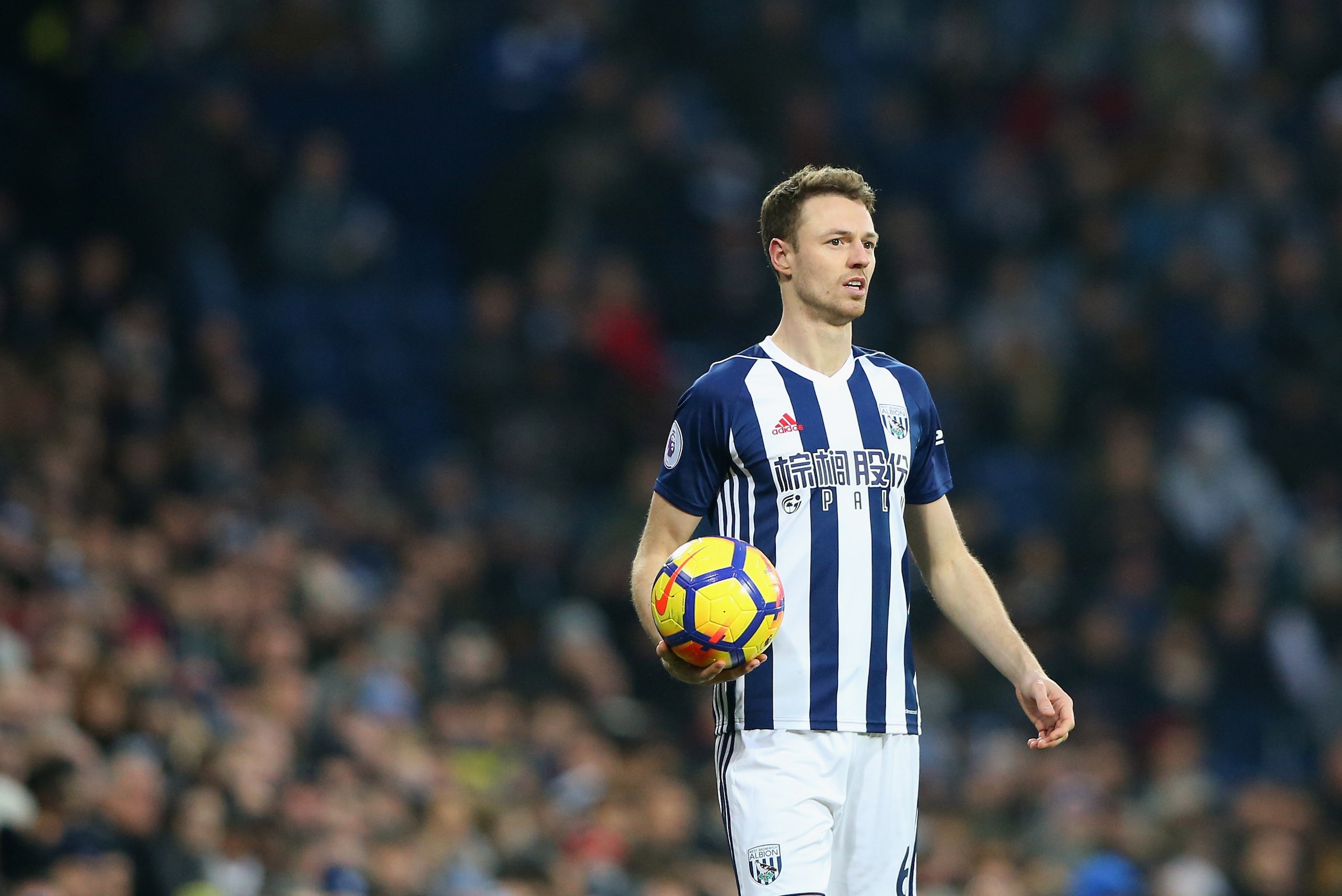 WEST BROMWICH, ENGLAND - JANUARY 13:  Jonny Evans of West Bromwich Albion takes a throw in during the Premier League match between West Bromwich Albion and Brighton and Hove Albion at The Hawthorns on January 13, 2018 in West Bromwich, England.  (Photo by