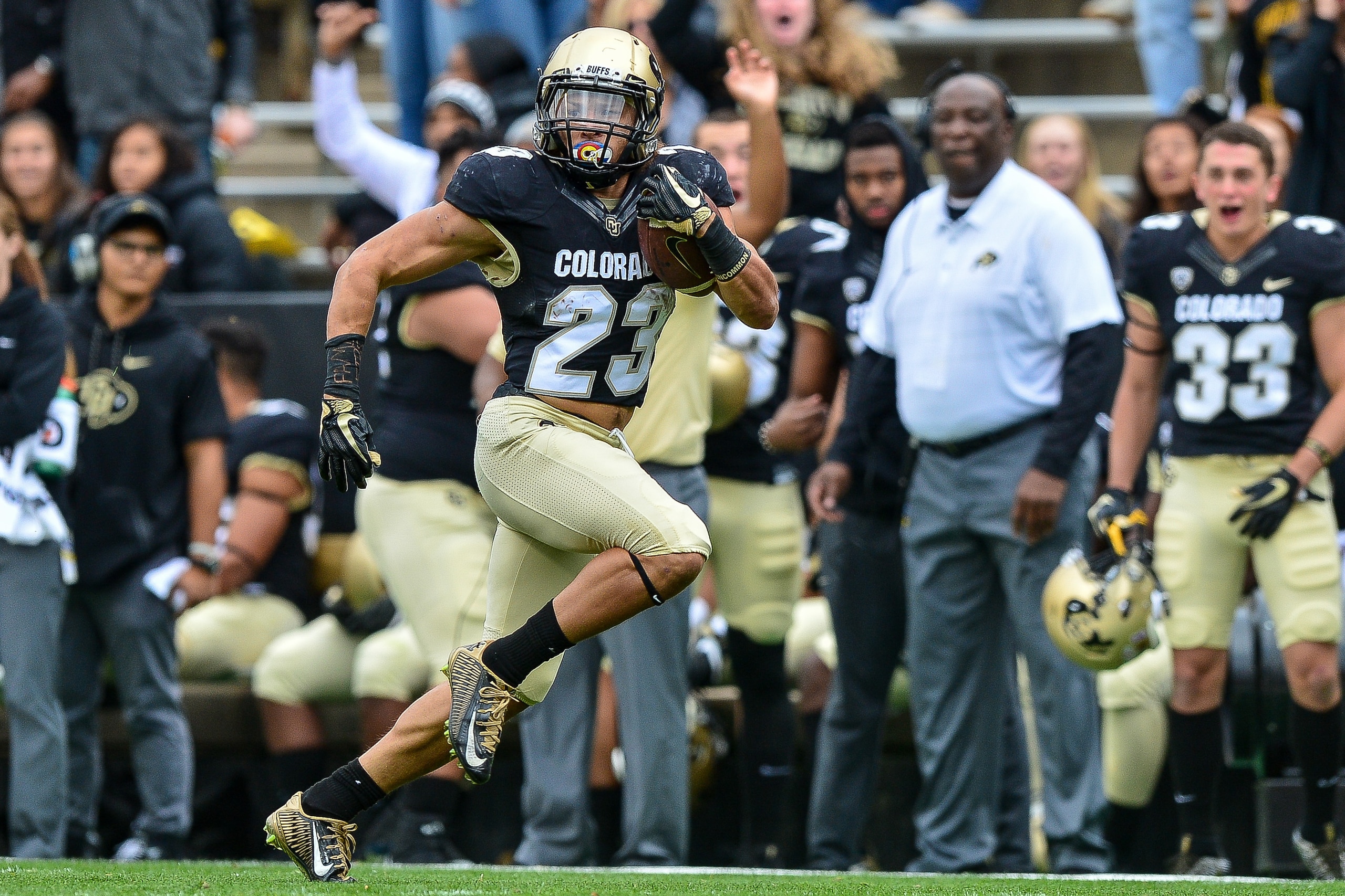 BOULDER, CO - OCTOBER 28:  Running back Phillip Lindsay #23 of the Colorado Buffaloes rushes in the first quarter of a game against the California Golden Bears at Folsom Field on October 28, 2017 in Boulder, Colorado.  (Photo by Dustin Bradford/Getty Imag