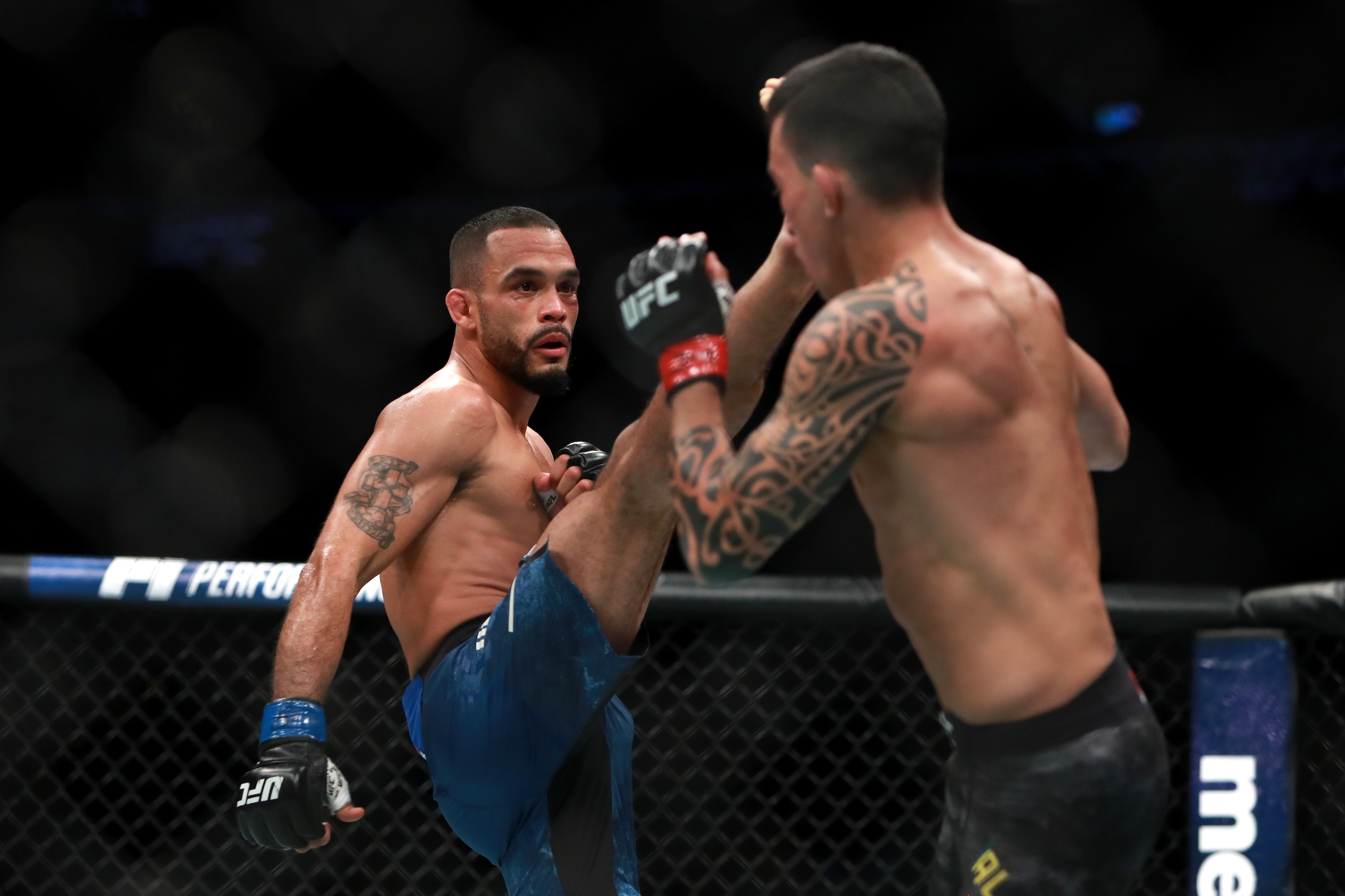 BOSTON, MA - JANUARY 20: Rob Font kicks against Thomas Almeida in their Bantamweight fight during UFC 220 at TD Garden on January 20, 2018 in Boston, Massachusetts. (Photo by Mike Lawrie/Getty Images) BOSTON, MA - JANUARY 20: Rob Font kicks against Thomas Almeida in their Bantamweight fight during UFC 220 at TD Garden on January 20, 2018 in Boston, Massachusetts. (Photo by Mike Lawrie/Getty Images)