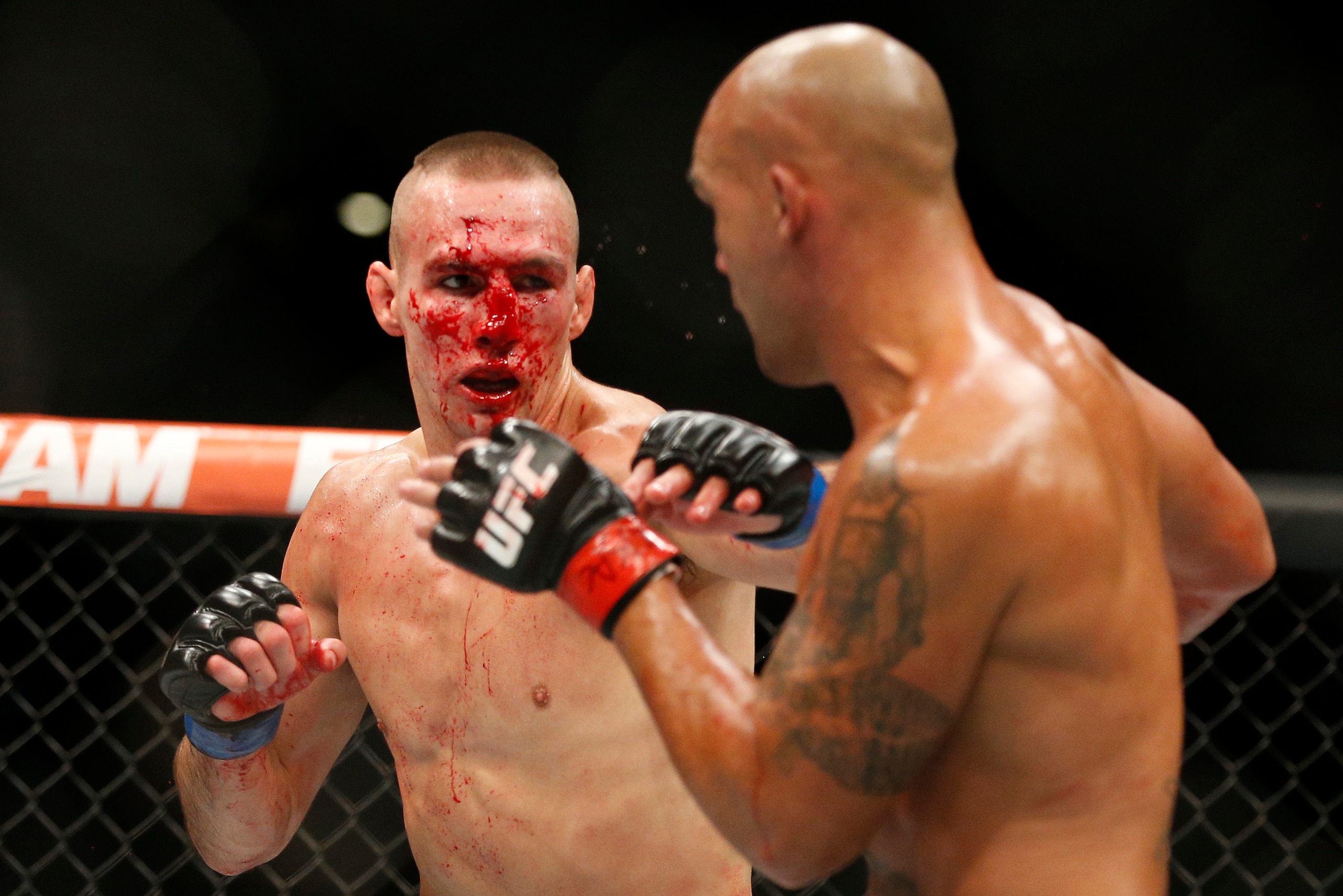Against Lawler, MacDonald wore a crimson mask. Against Lawler, MacDonald wore a crimson mask.