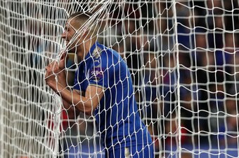 Leicester City's Algerian striker Islam Slimani reacts after missing a good chance during the English League Cup fourth round football match between Leicester City and Leeds United at King Power Stadium in Leicester, central England on October 24, 2017. /
