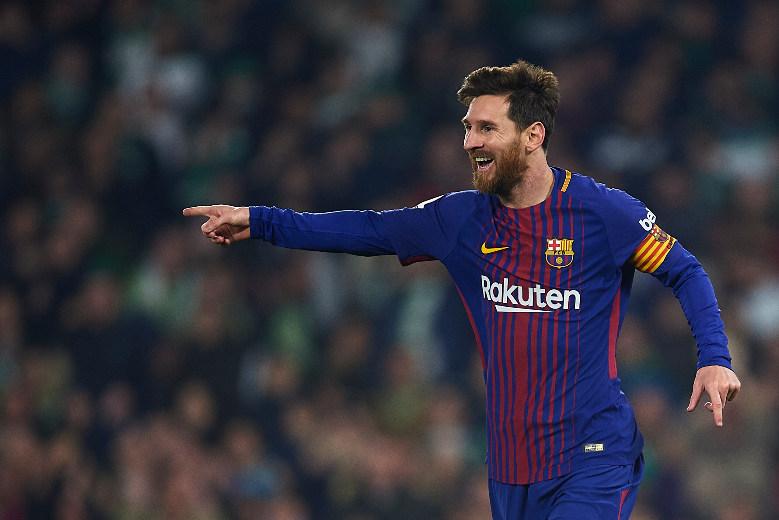 SEVILLE, SPAIN - JANUARY 21:  Lionel Messi of FC Barcelona  celebrates after scoring the second goal for FC Barcelona during the La Liga match between Real Betis and Barcelona at Estadio Benito Villamarin on January 21, 2018 in Seville, .  (Photo by Aitor