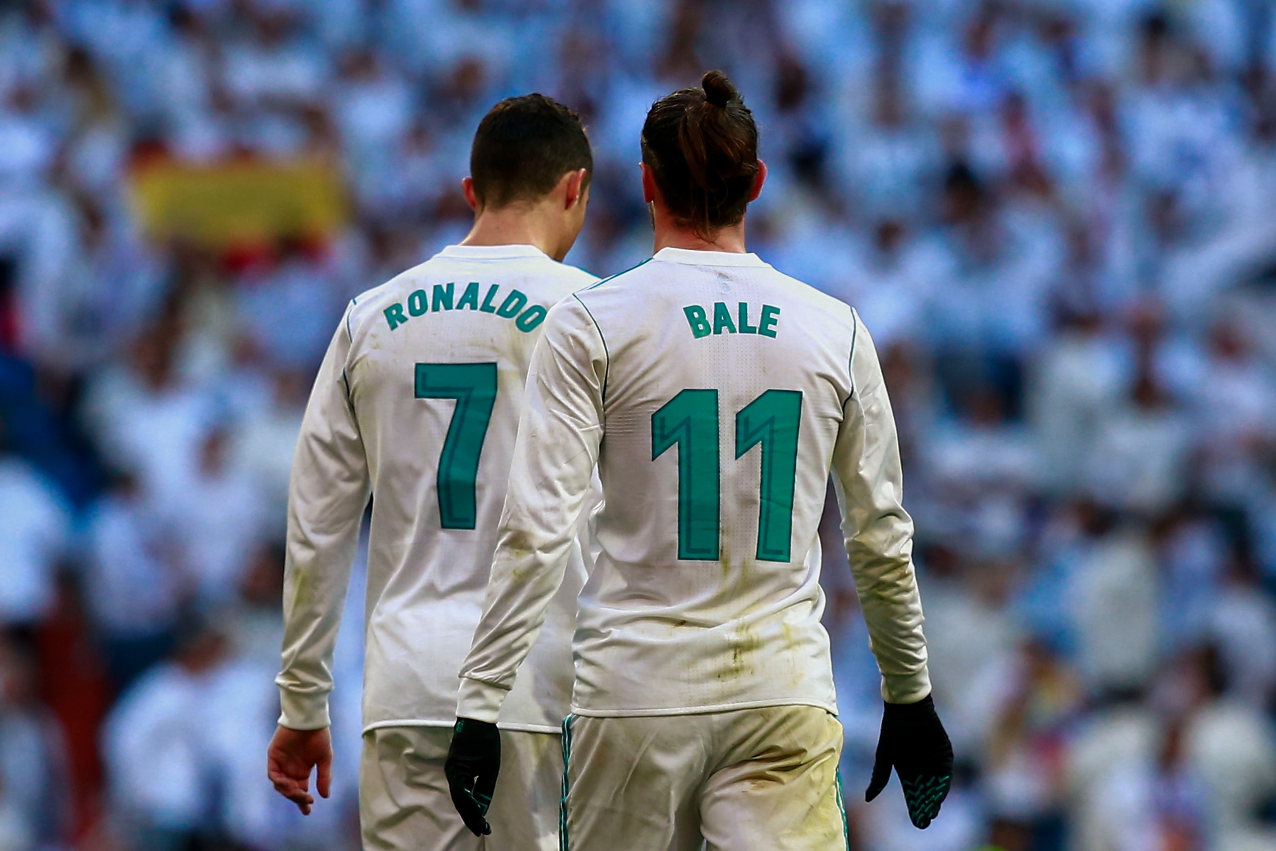 MADRID, SPAIN - JANUARY 21: Cristiano Ronaldo (L) of Real Madrid CF and his teammate Gareth Bale (R) in action during the La Liga match between Real Madrid CF and Deportivo La Coruna at Estadio Santiago Bernabeu on January 21, 2018 in Madrid, Spain. (Phot
