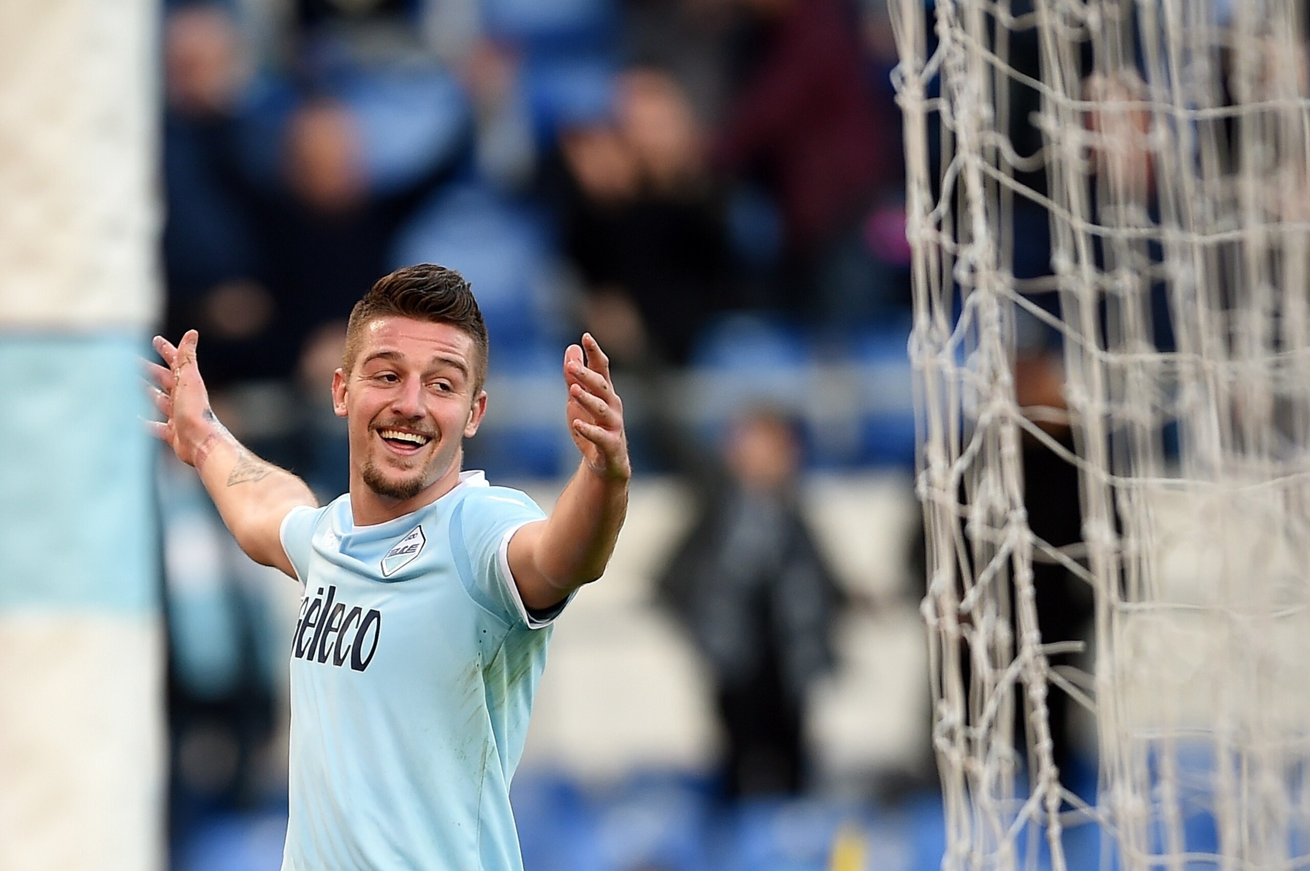 Lazio's midfielder from Serbia Sergej Milinkovic-Savic celebrates after scoring during the Italian Serie A football match Lazio vs Chievo at the Olympic Stadium in Rome on January 21, 2018.  / AFP PHOTO / FILIPPO MONTEFORTE        (Photo credit should rea