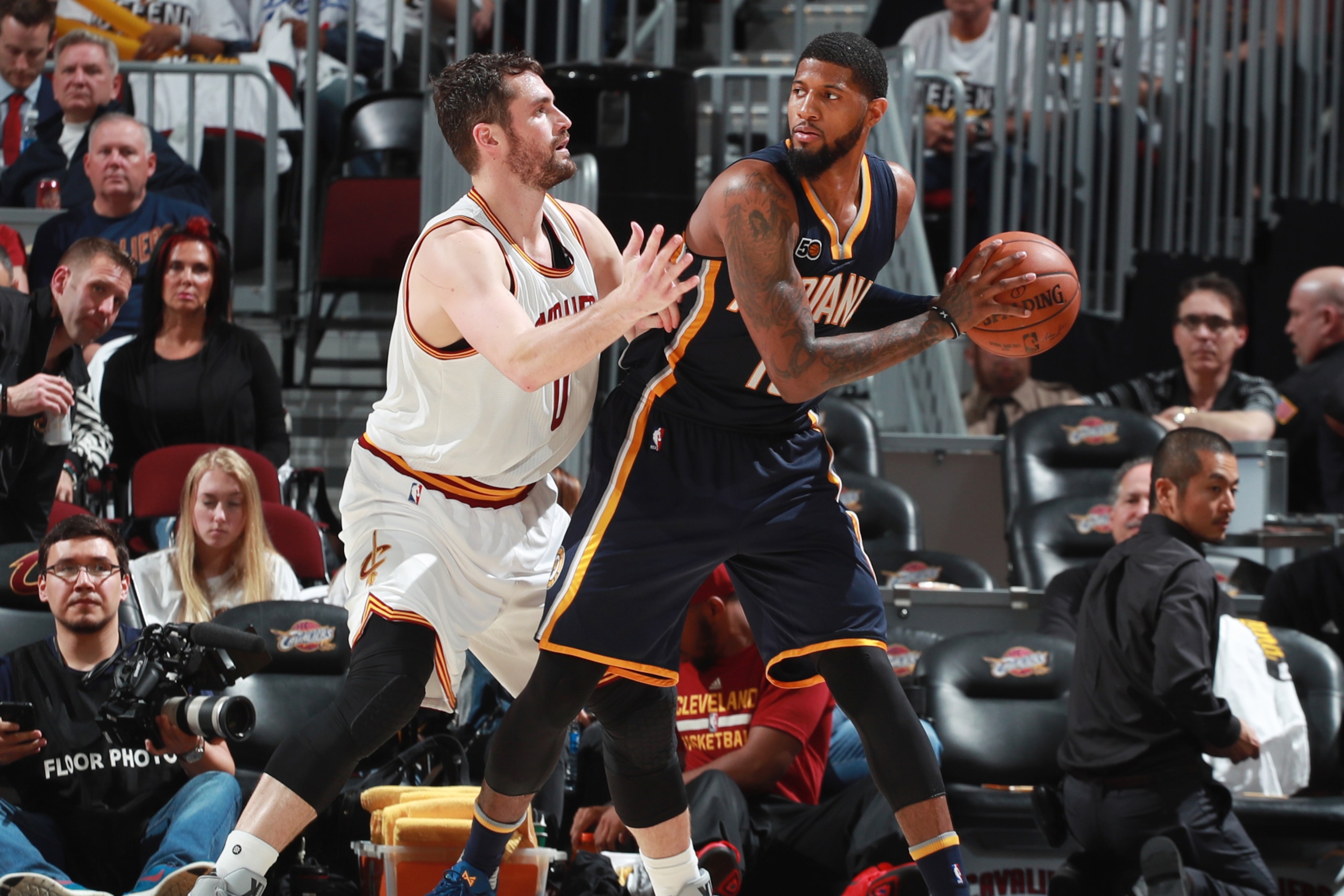 CLEVELAND, OH - APRIL 15:  Paul George #13 of the Indiana Pacers handles the ball against Kevin Love #0 of the Cleveland Cavaliers during a game in Round One of the Eastern Conference Playoffs during the 2017 NBA Playoffs on April 15, 2017 at Quicken Loan