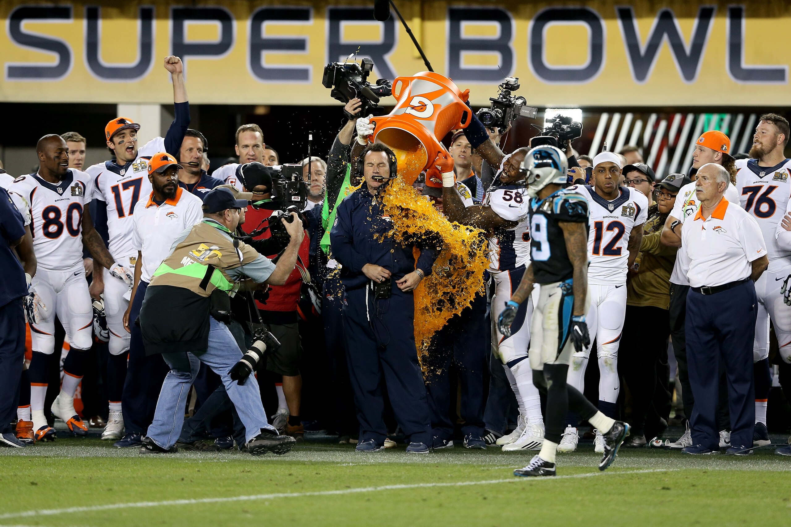 SANTA CLARA, CA - FEBRUARY 07:  Head coach Gary Kubiak of the Denver Broncos is splashed with Gatorade in the final moments their Super Bowl 50 win at Levi's Stadium on February 7, 2016 in Santa Clara, California. The Denver Broncos defeated the Carolina 
