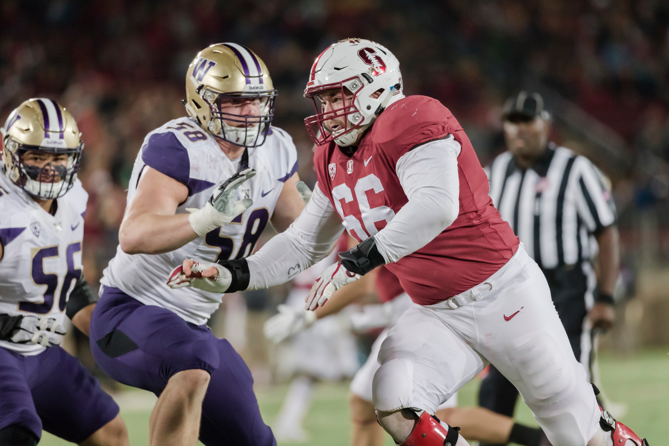 PALO ALTO, CA - NOVEMBER 10: Harrison Phillips #66 of the Stanford Cardinal plays in an NCAA Pac-12 football game against the University of Washington Huskies on November 10, 2017 at Stanford Stadium in Palo Alto, California. Also visible are Jared Pu PALO ALTO, CA - NOVEMBER 10: Harrison Phillips #66 of the Stanford Cardinal plays in an NCAA Pac-12 football game against the University of Washington Huskies on November 10, 2017 at Stanford Stadium in Palo Alto, California. Also visible are Jared Pu