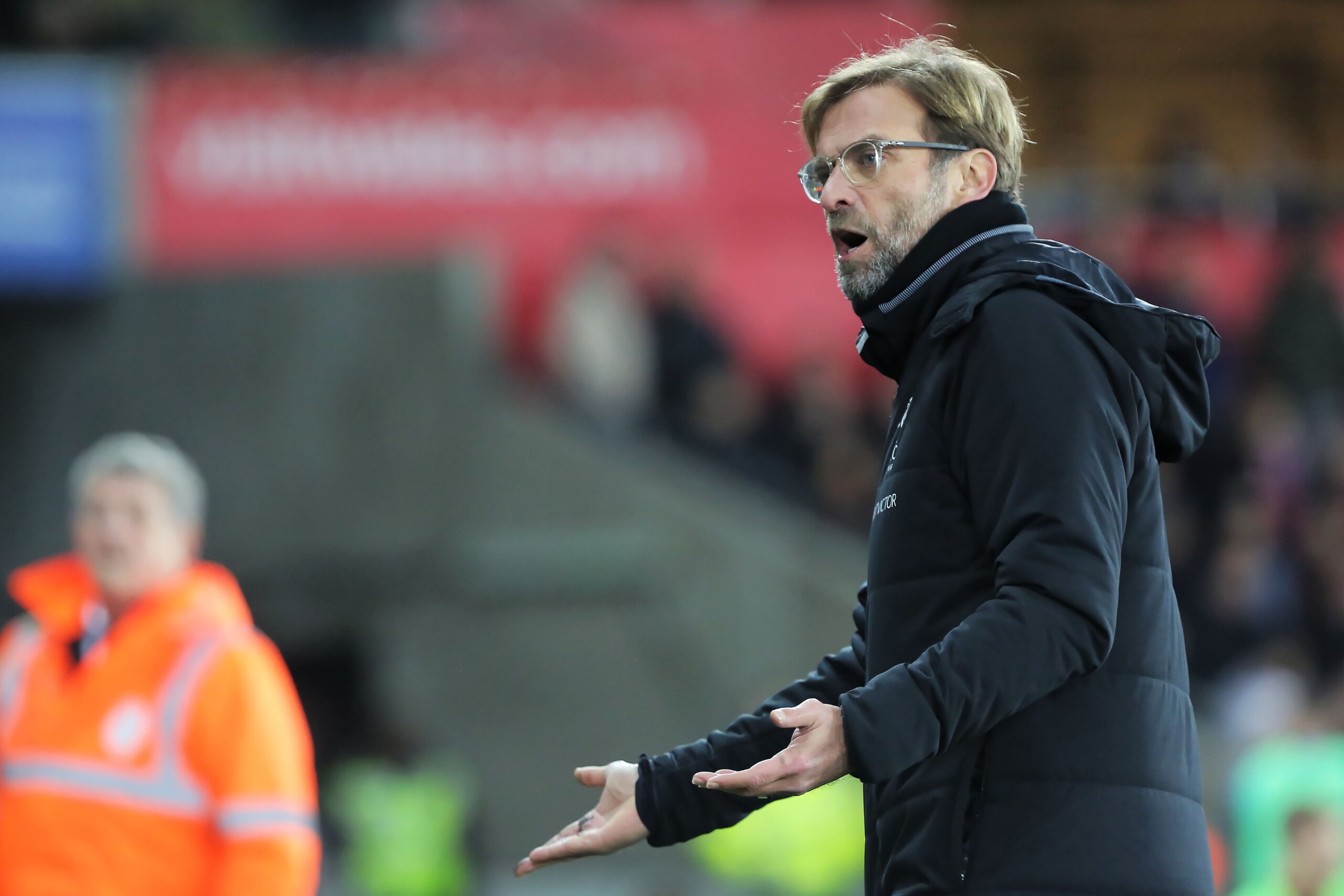 SWANSEA, WALES - JANUARY 22: Liverpool manager Jurgen Klopp protests to the fourth official during the Premier League match between Swansea City and Liverpool at The Liberty Stadium on January 22, 2018 in Swansea, Wales. (Photo by Athena Pictures/Getty Im