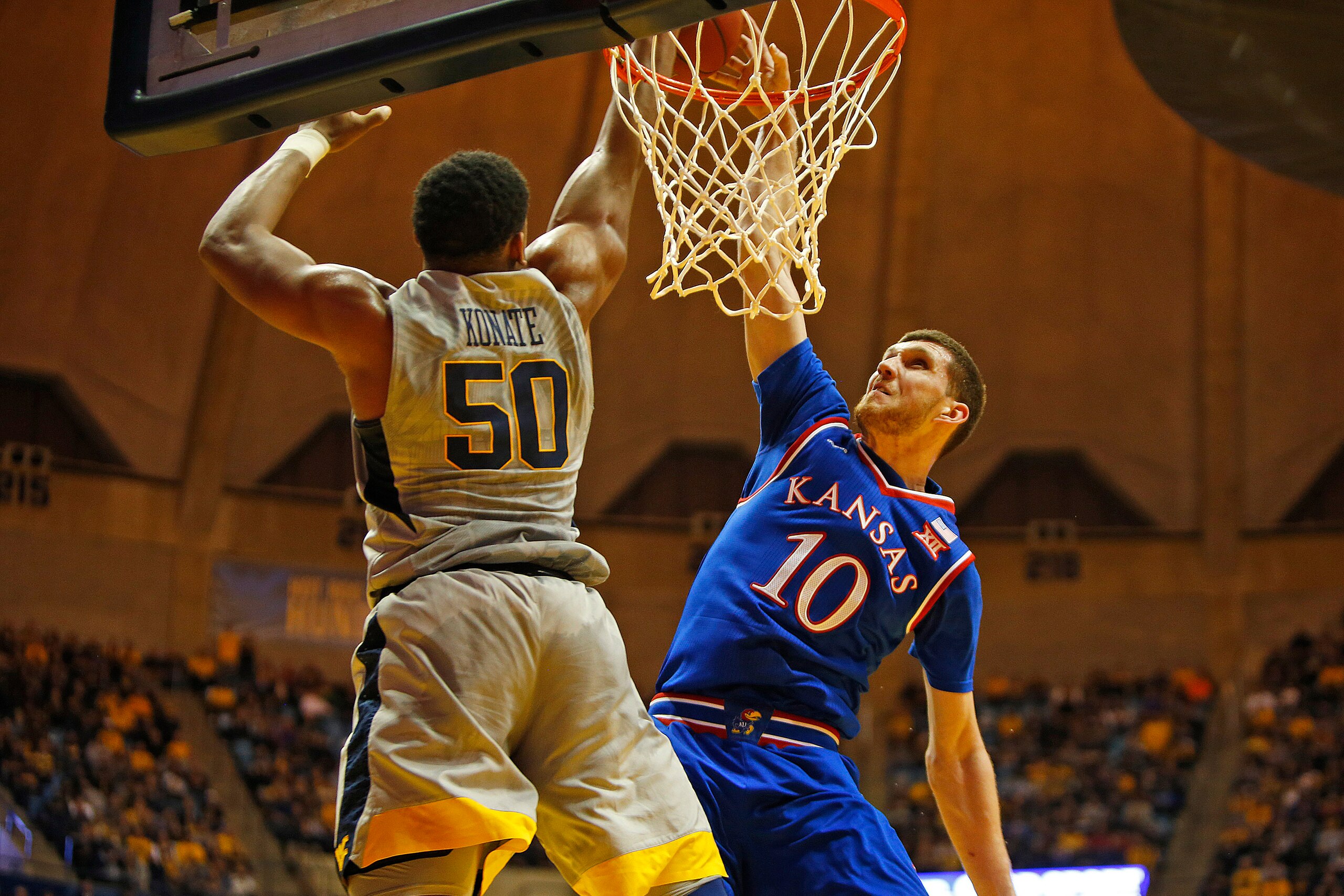 MORGANTOWN, WV - JANUARY 15:  Sagaba Konate #50 of the West Virginia Mountaineers blocks the shot of Sviatoslav Mykhailiuk #10 of the Kansas Jayhawks at the WVU Coliseum on January 15, 2018 in Morgantown, West Virginia.  (Photo by Justin K. Aller/Getty Im