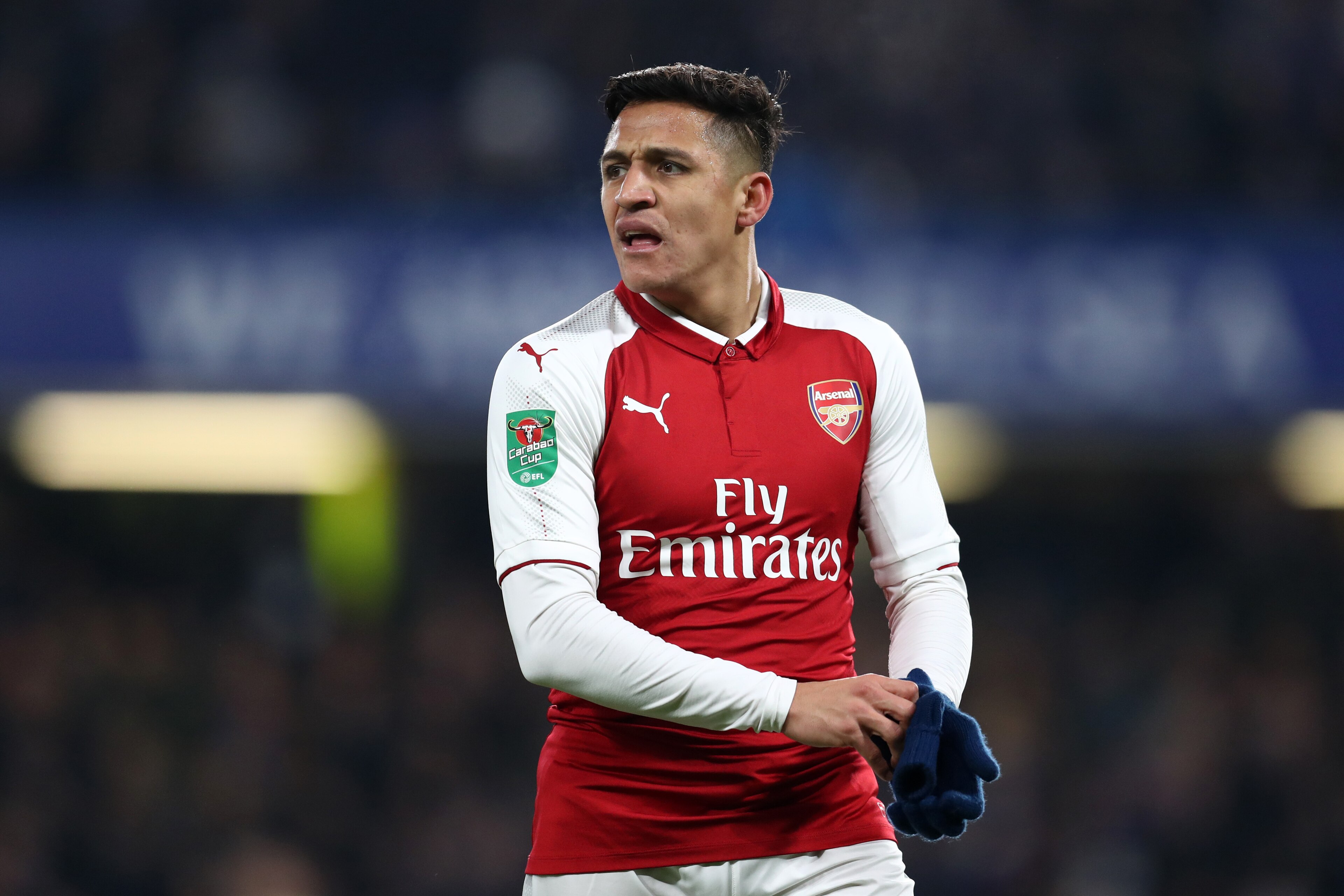 LONDON, ENGLAND - JANUARY 10: Alexis Sanchez of Arsenal during the Carabao Cup Semi-Final First Leg match between Chelsea and Arsenal at Stamford Bridge on January 10, 2018 in London, England. (Photo by Catherine Ivill/Getty Images) LONDON, ENGLAND - JANUARY 10: Alexis Sanchez of Arsenal during the Carabao Cup Semi-Final First Leg match between Chelsea and Arsenal at Stamford Bridge on January 10, 2018 in London, England. (Photo by Catherine Ivill/Getty Images)