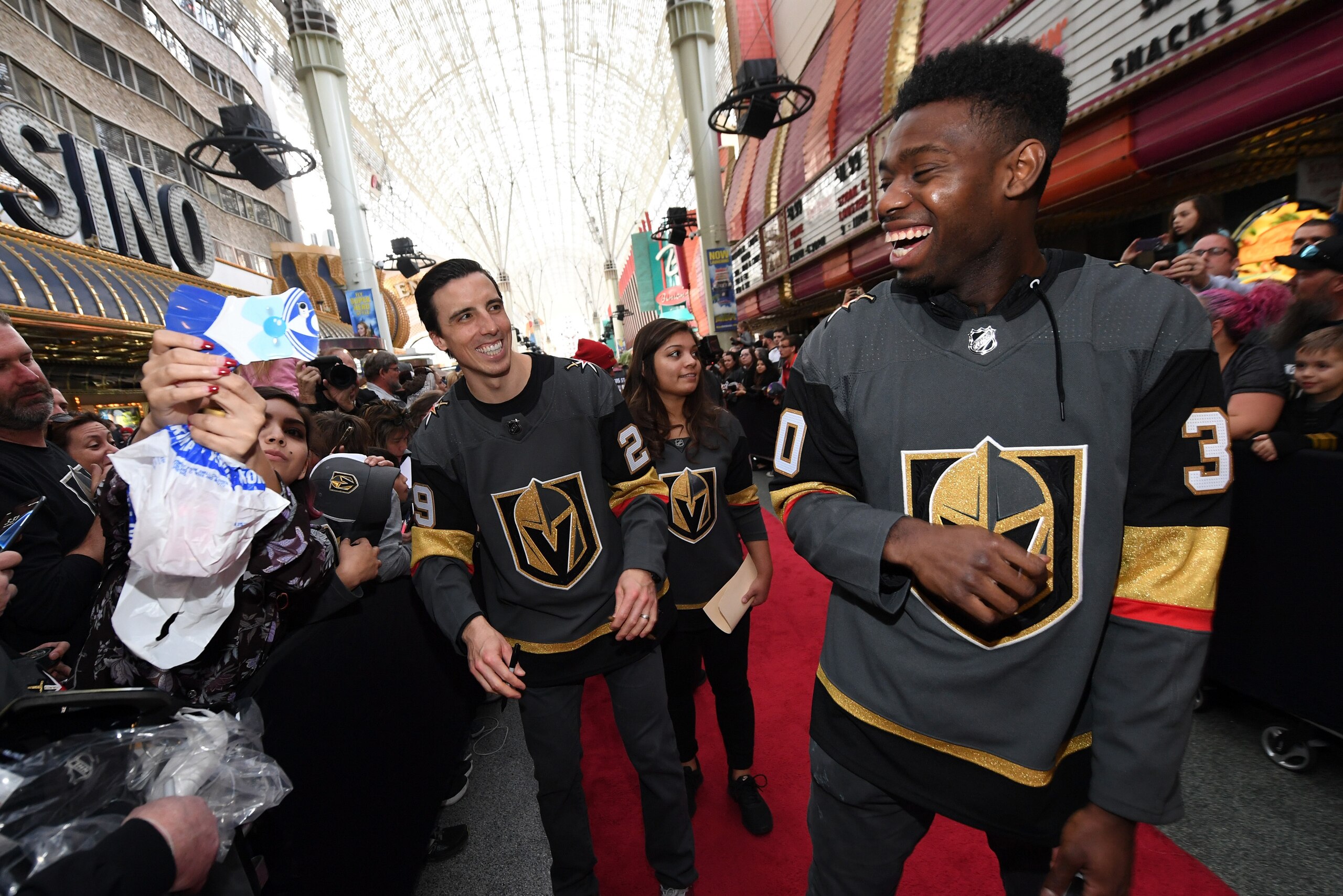 LAS VEGAS, NV - JANUARY 14: Goaltenders Marc-Andre Fleury #29 and Malcolm Subban #30 of the Vegas Golden Knights laugh as they sign autographs for fans on a red carpet during the Vegas Golden Knights Fan Fest at the Fremont Street Experience on January 1 LAS VEGAS, NV - JANUARY 14: Goaltenders Marc-Andre Fleury #29 and Malcolm Subban #30 of the Vegas Golden Knights laugh as they sign autographs for fans on a red carpet during the Vegas Golden Knights Fan Fest at the Fremont Street Experience on January 1