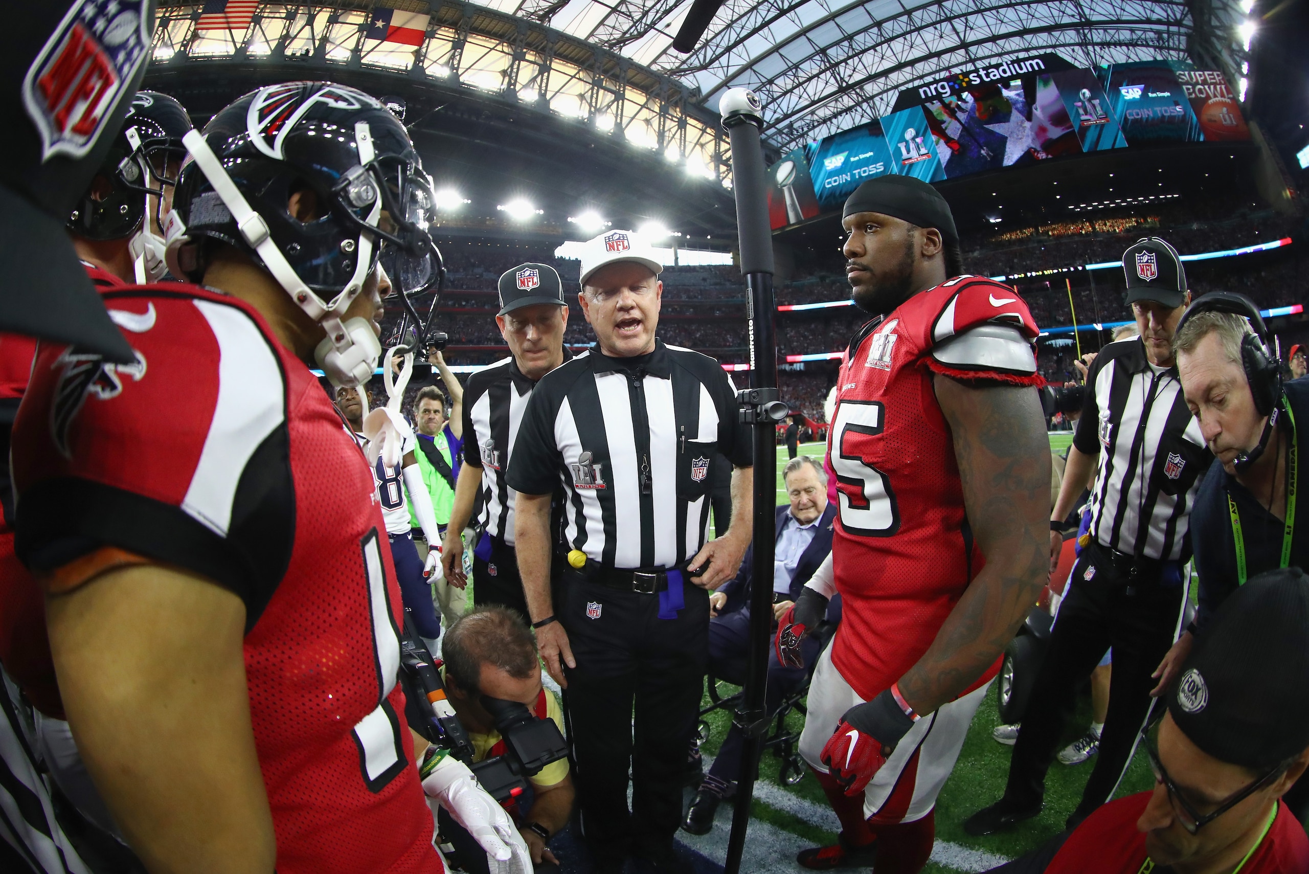HOUSTON, TX - FEBRUARY 05: Referee Carl Cheffers #51 speaks to players during the coin toss before Super Bowl 51 between the Atlanta Falcons and the New England Patriots at NRG Stadium on February 5, 2017 in Houston, Texas.  (Photo by Al Bello/Getty Image