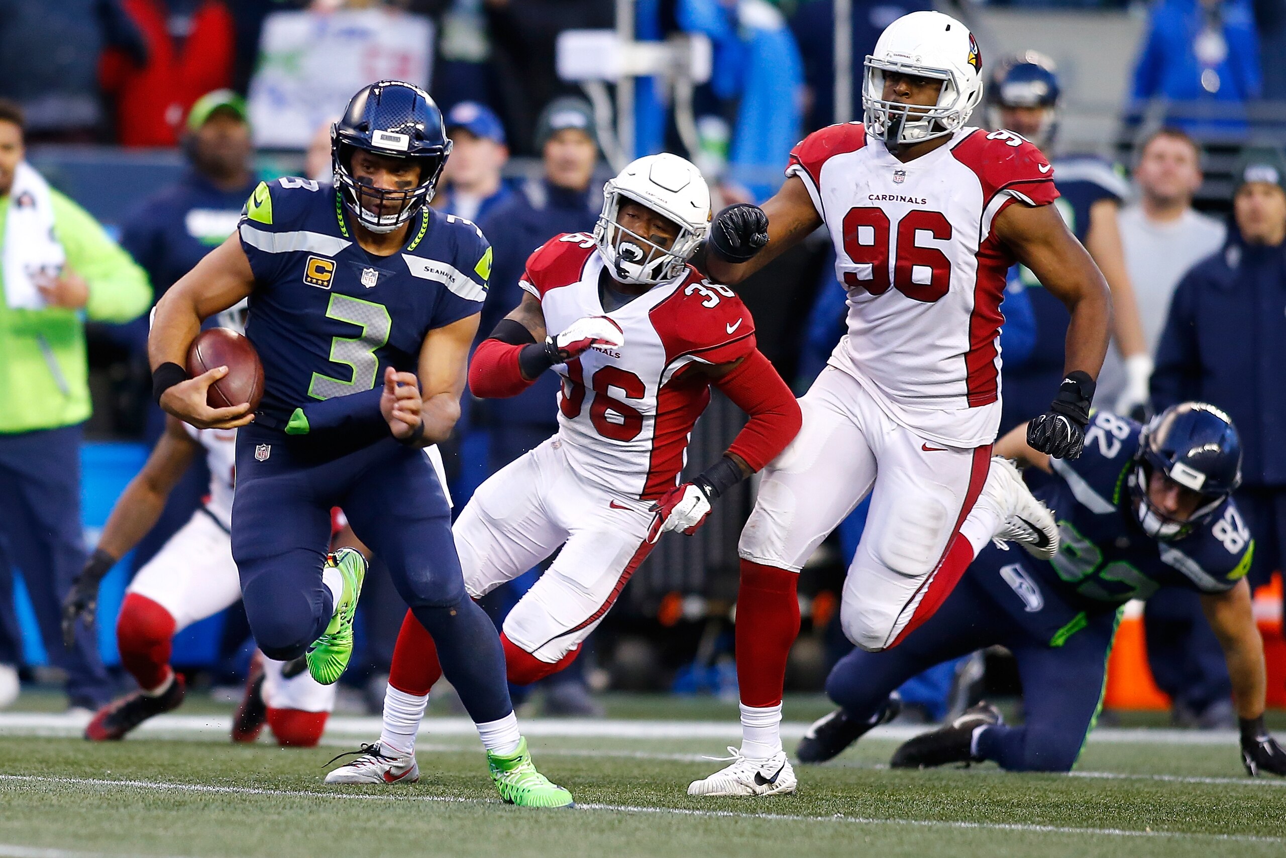 SEATTLE, WA - DECEMBER 31:  Russell Wilson #3 of the Seattle Seahawks in action against the Arizona Cardinals at CenturyLink Field on December 31, 2017 in Seattle, Washington.  (Photo by Jonathan Ferrey/Getty Images)