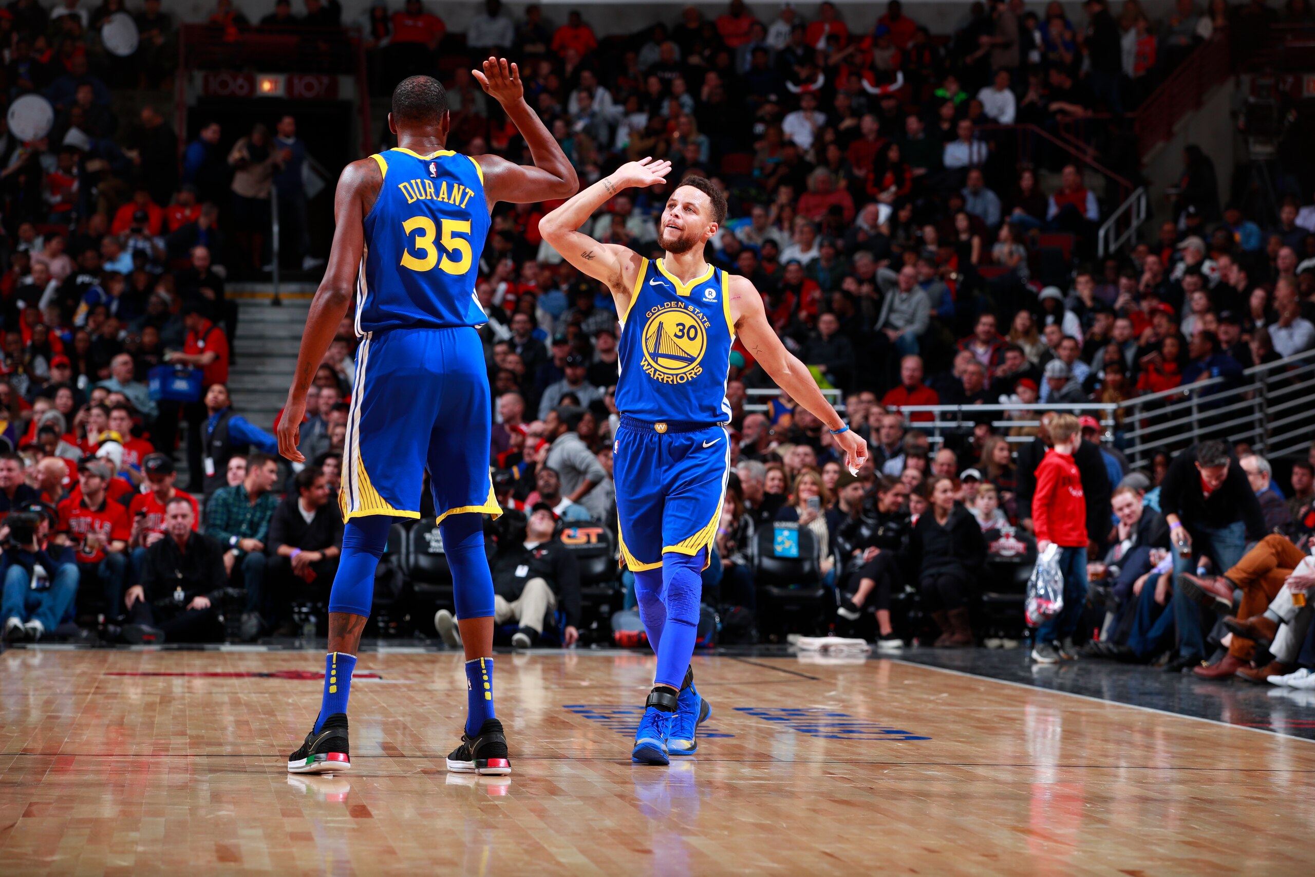 CHICAGO, IL - JANUARY 17: Kevin Durant #35 and Stephen Curry #30 of the Golden State Warriors react during game against the Chicago Bulls on January 17, 2018 at the United Center in Chicago, Illinois. NOTE TO USER: User expressly acknowledges and agrees t