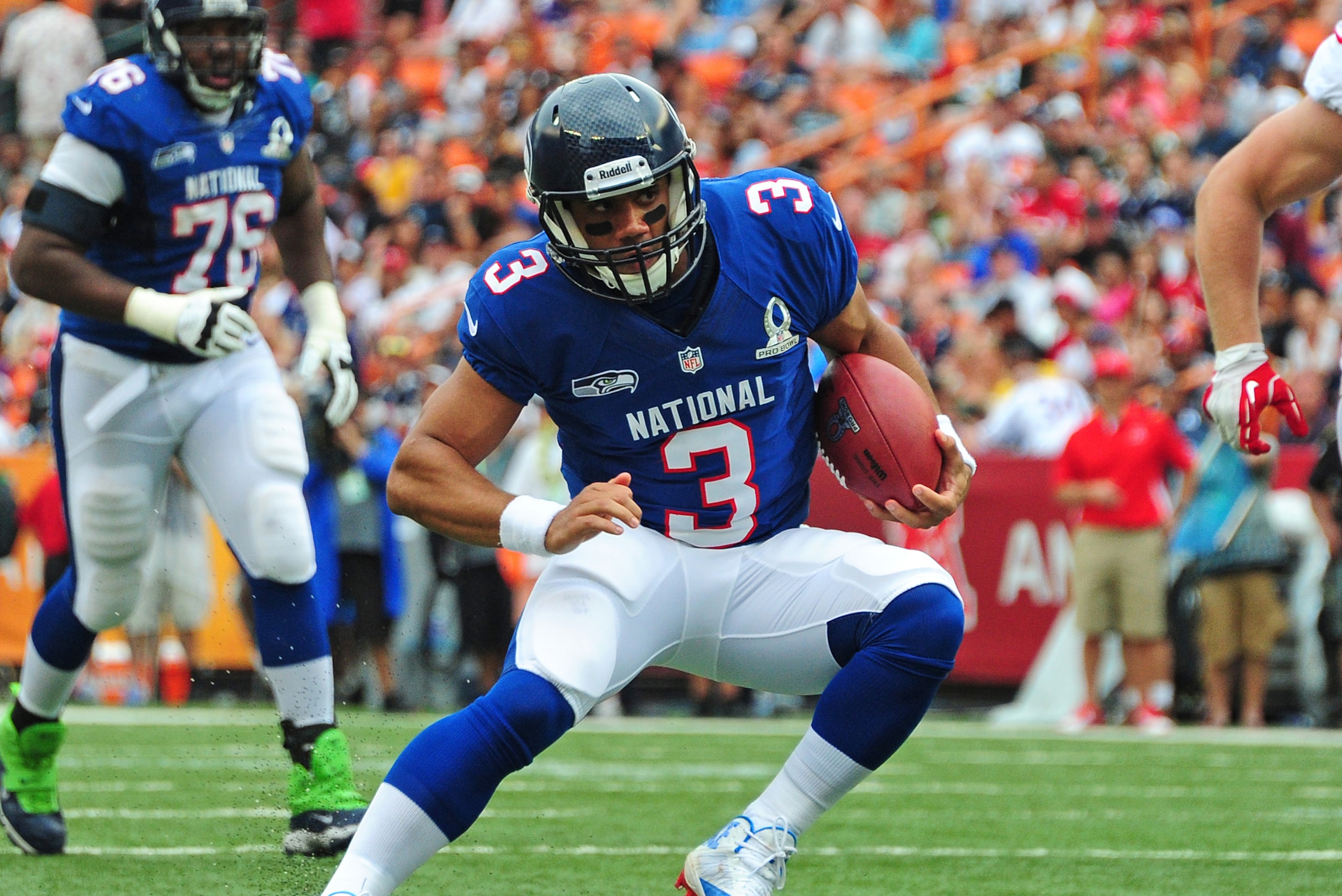 HONOLULU, HI - JANUARY 27: Russell Wilson #3 of the Seattle Seahawks and the NFC scrambles against the AFC team during the 2013 Pro Bowl at Aloha Stadium on January 27, 2013 in Honolulu, Hawaii.  (Photo by Scott Cunningham/Getty Images)