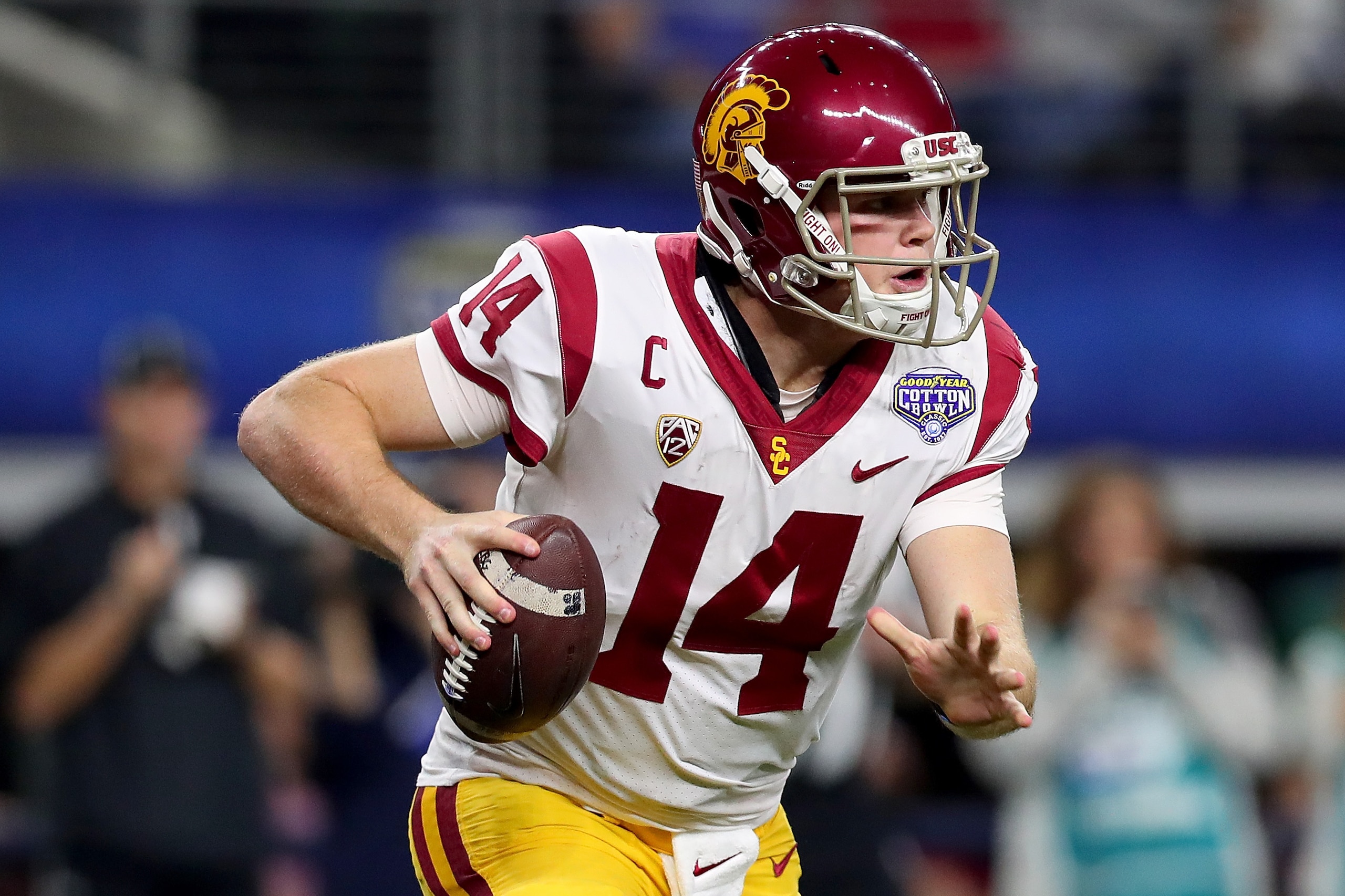 ARLINGTON, TX - DECEMBER 29:  Sam Darnold #14 of the USC Trojans looks for an open receiver against the Ohio State Buckeyes during the Goodyear Cotton Bowl Classic at AT&T Stadium on December 29, 2017 in Arlington, Texas.  (Photo by Tom Pennington/Getty I
