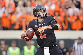STILLWATER, OK - NOVEMBER 04: Quarterback Mason Rudolph #2 of the Oklahoma State Cowboys looks to throw against the Oklahoma Sooners at Boone Pickens Stadium on November 4, 2017 in Stillwater, Oklahoma. Oklahoma defeated Oklahoma State 62-52.  (Photo by B