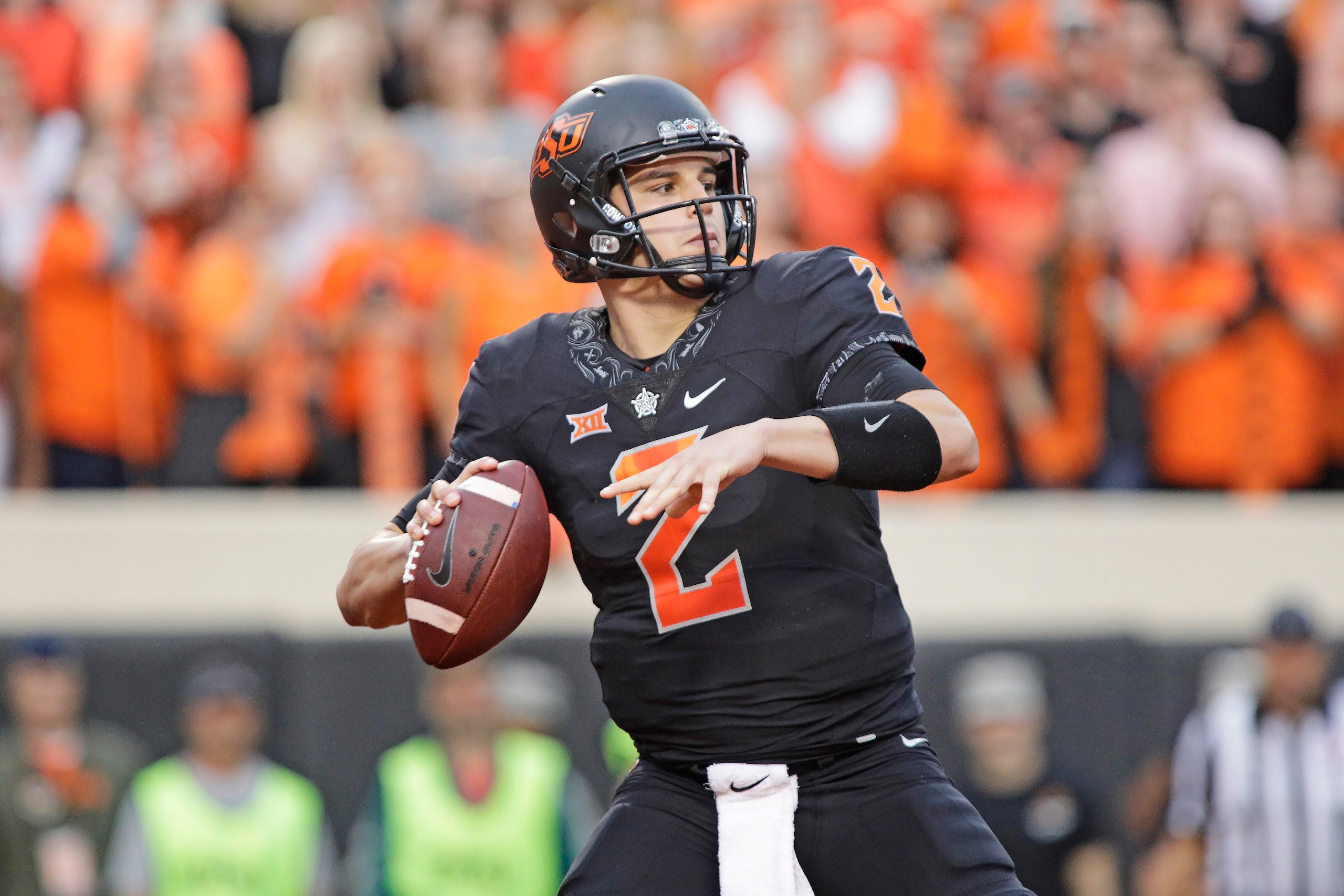 STILLWATER, OK - NOVEMBER 04: Quarterback Mason Rudolph #2 of the Oklahoma State Cowboys looks to throw against the Oklahoma Sooners at Boone Pickens Stadium on November 4, 2017 in Stillwater, Oklahoma. Oklahoma defeated Oklahoma State 62-52.  (Photo by B