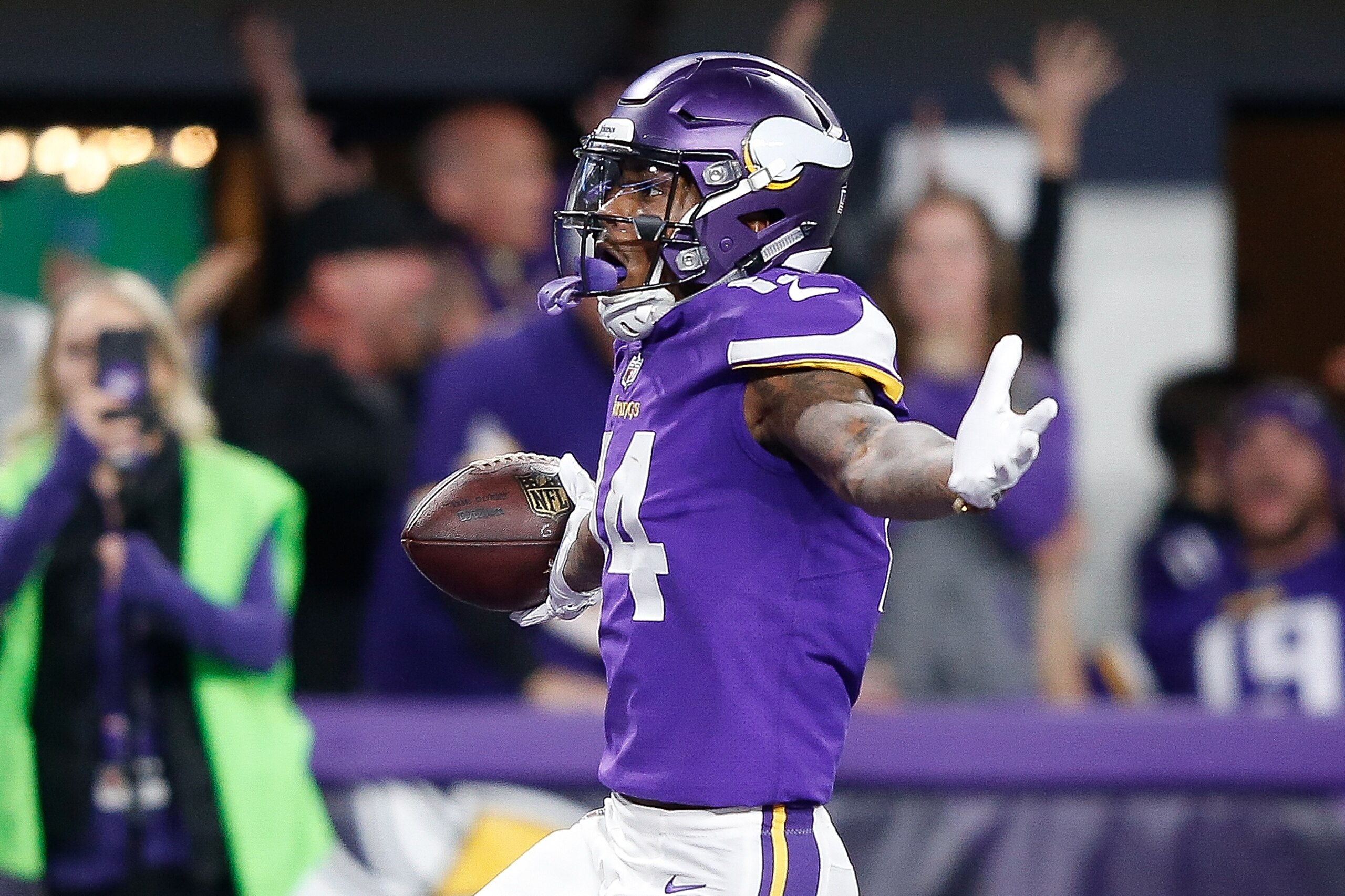 MINNEAPOLIS, MN - JANUARY 14:  Stefon Diggs #14 of the Minnesota Vikings celebrates after scoring a touchdown to defeat the New Orleans Saints in the NFC Divisional Playoff game at U.S. Bank Stadium on January 14, 2018 in Minneapolis, Minnesota.  (Photo b