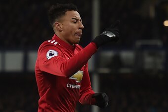 Manchester United's English midfielder Jesse Lingard celebrates scoring the team's second goal during the English Premier League football match between Everton and Manchester United at Goodison Park in Liverpool, north west England on January 1, 2018. / A