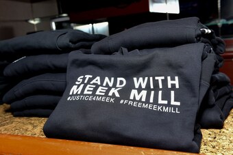 PHILADELPHIA, PA - DECEMBER 01:  76ers stars Joel Embiid and Ben Simmons are among celebrities to support Meek Mill's fight for freedom with Free Meek Mill hoodies at Jay-Z's 4:44 tour stop in Philadelphia. Rapper Yo Gotti and R&b singer Trey Songz suppor