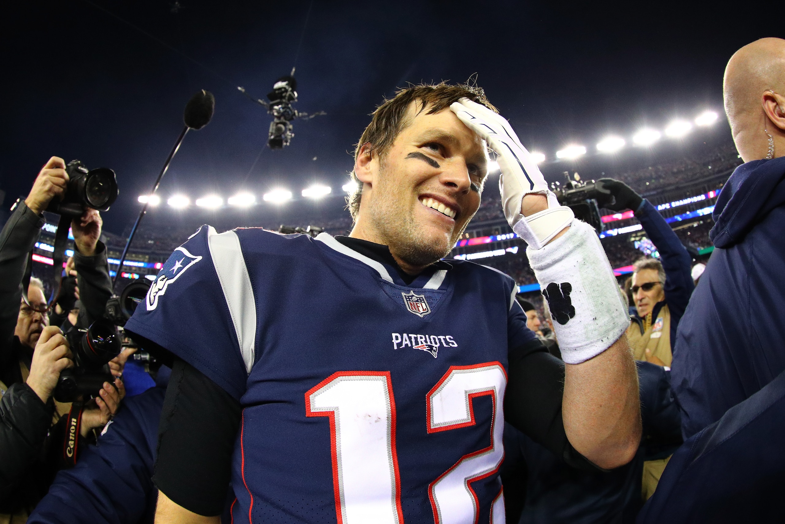 FOXBOROUGH, MA - JANUARY 21:  Tom Brady #12 of the New England Patriots reacts after winning the AFC Championship Game against the Jacksonville Jaguars at Gillette Stadium on January 21, 2018 in Foxborough, Massachusetts.  (Photo by Maddie Meyer/Getty Ima